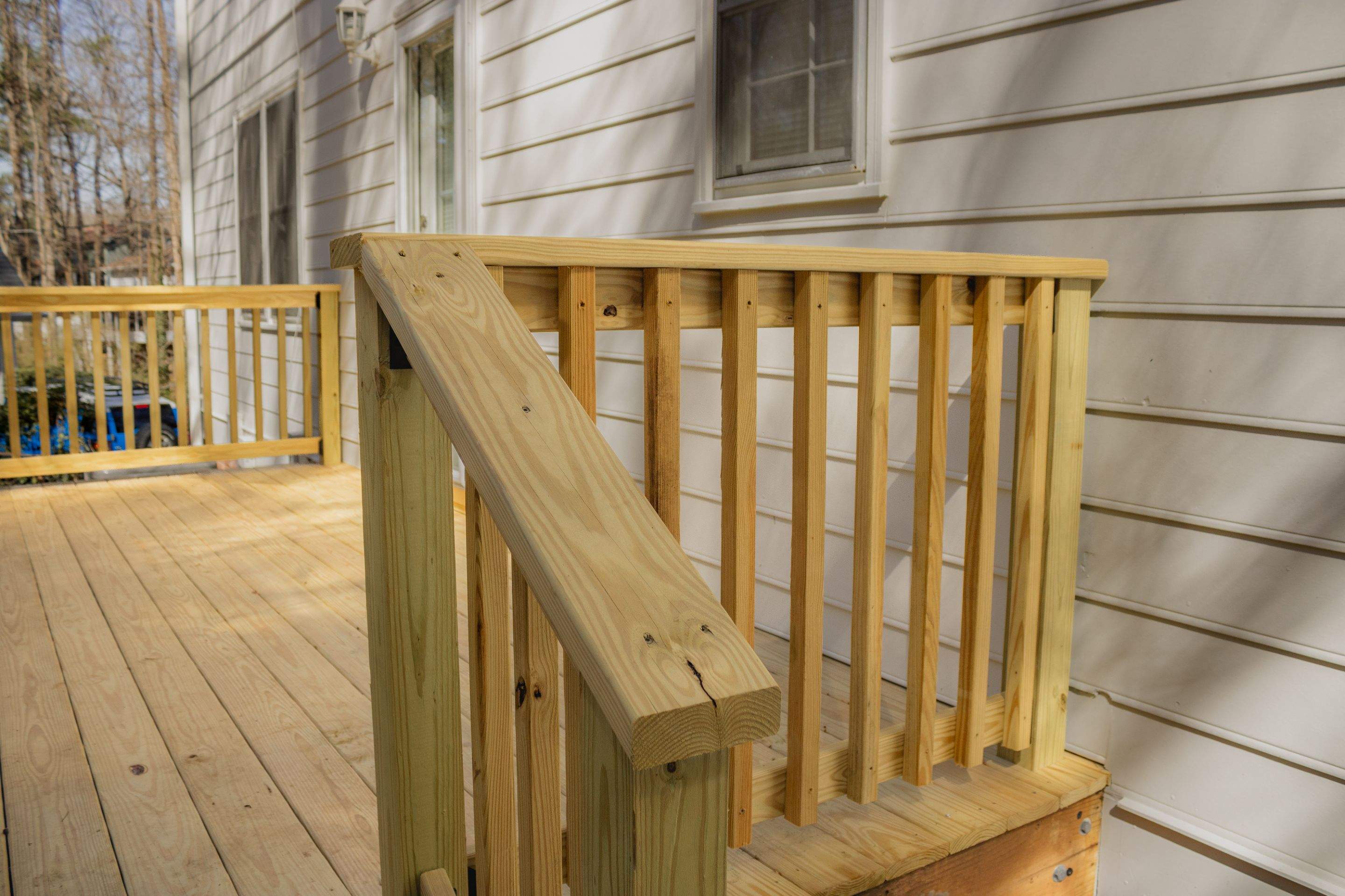 Deck Resurface with Wood Bench Install Using Pressure Treated Pine by Nelson Exteriors