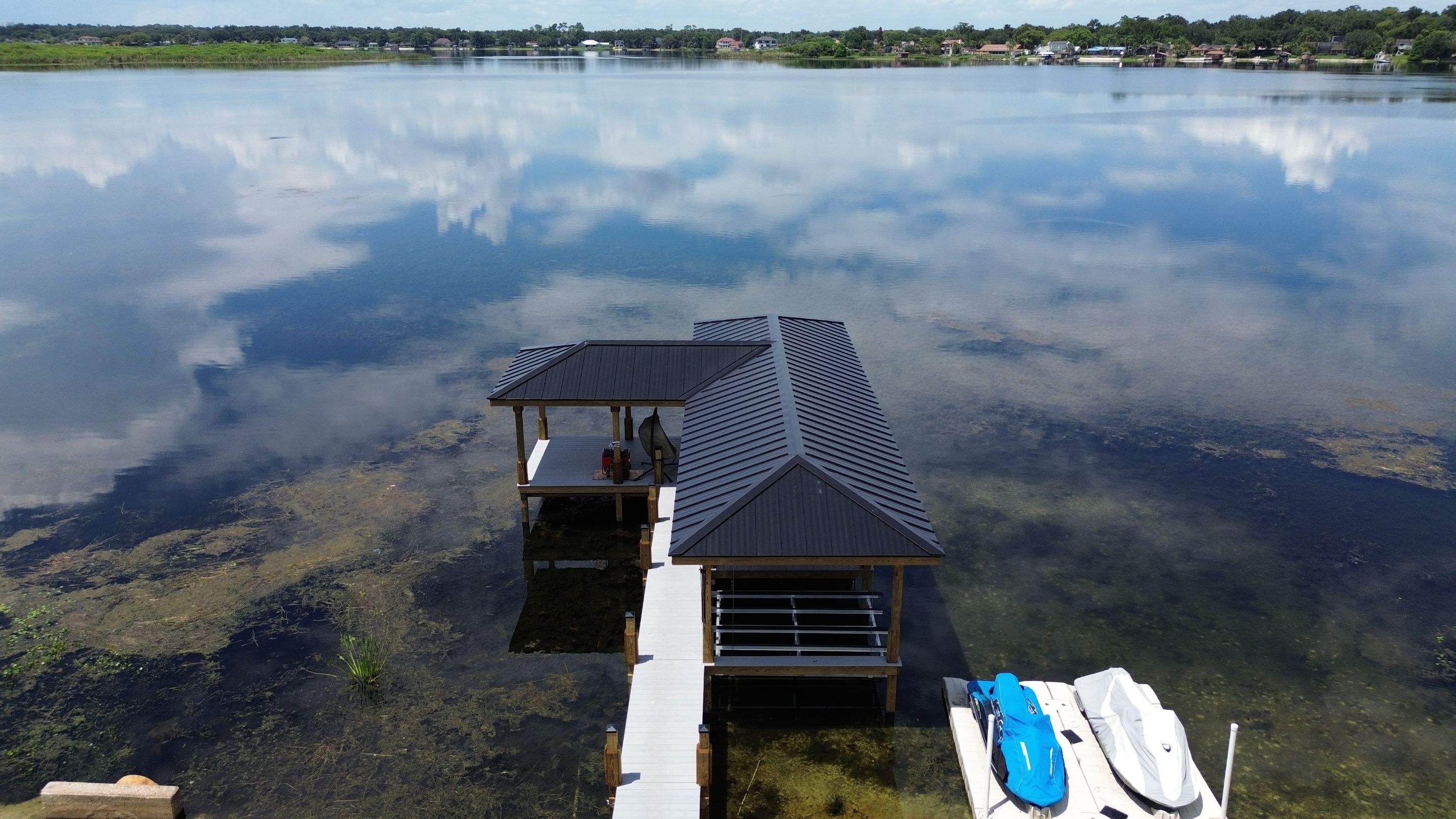 Residential Dock reroof  by Gold Key Roofing