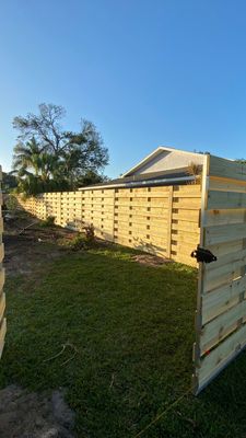 Wood Fence Installation using Shadowbox Wood Fence