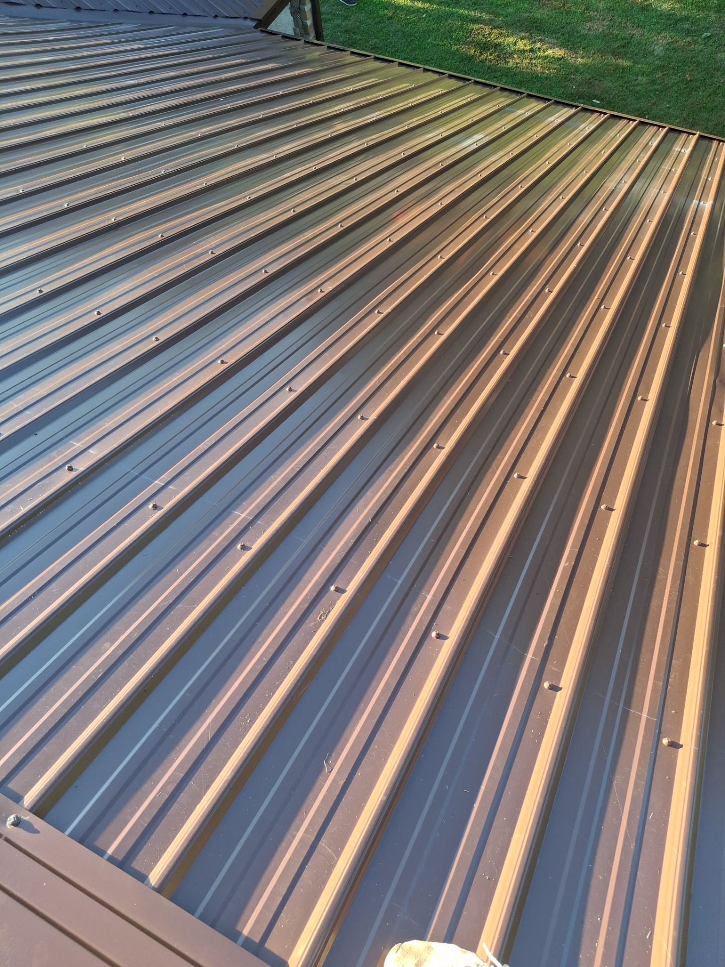 Residential Roofing Installation using Metal by Rainstoppers Roofing