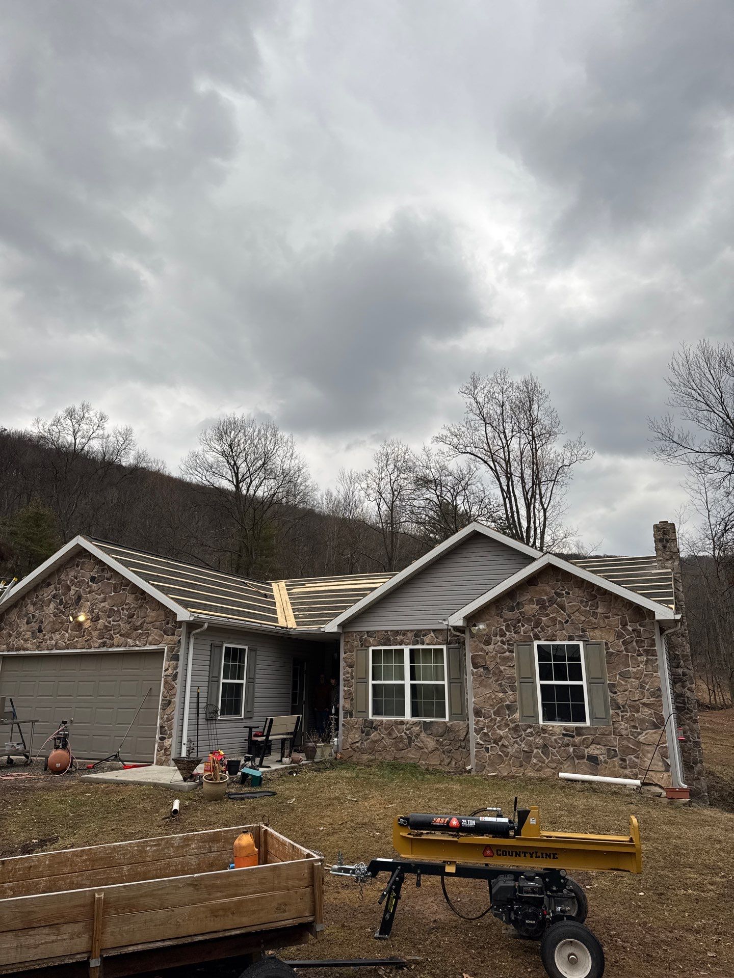 Black Metal Roof Replacement and Gutter Installation in Halifax by Esh Builders