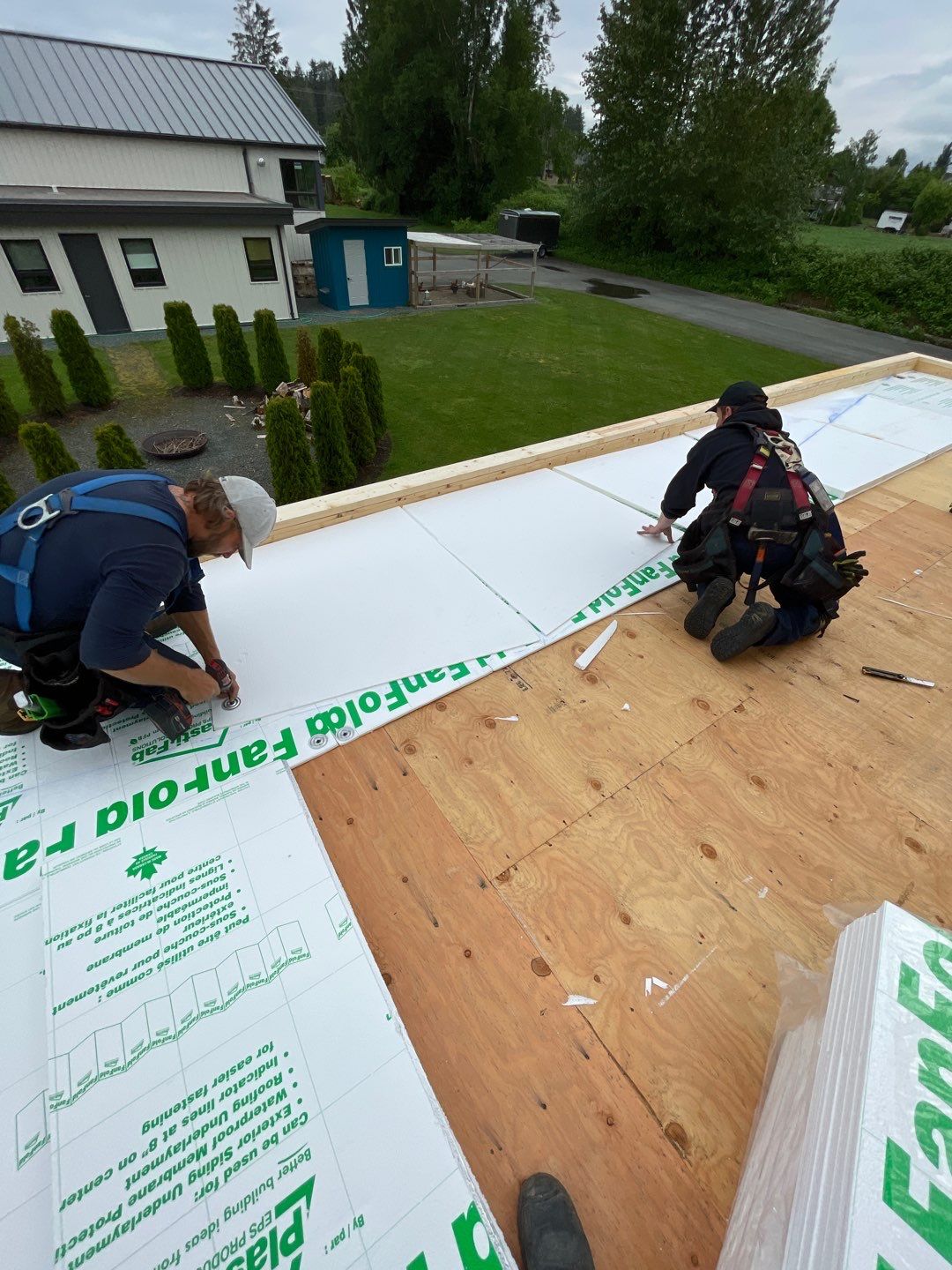 Residential Shop flat roofing Installation using Durolast membrane by Top Notch Roofing Inc