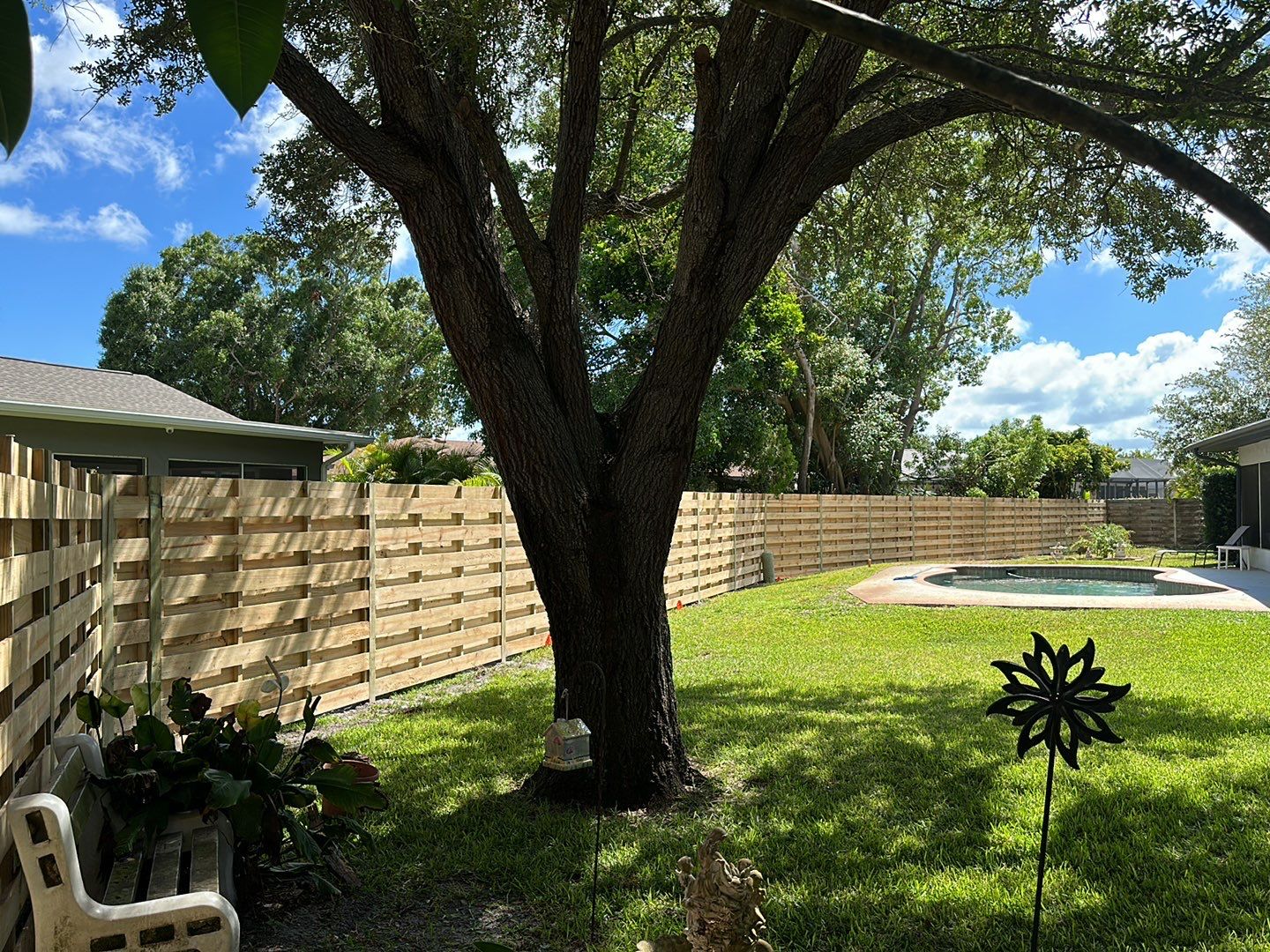 Wood Fence Installation using Horizontal Shadowbox Wood Privacy Fence by Asap fence and gates, LLC