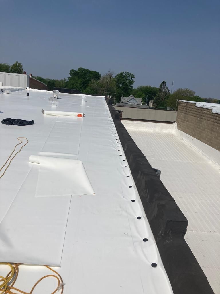 Recover of a downtown building  by Grell Roofing, LLC