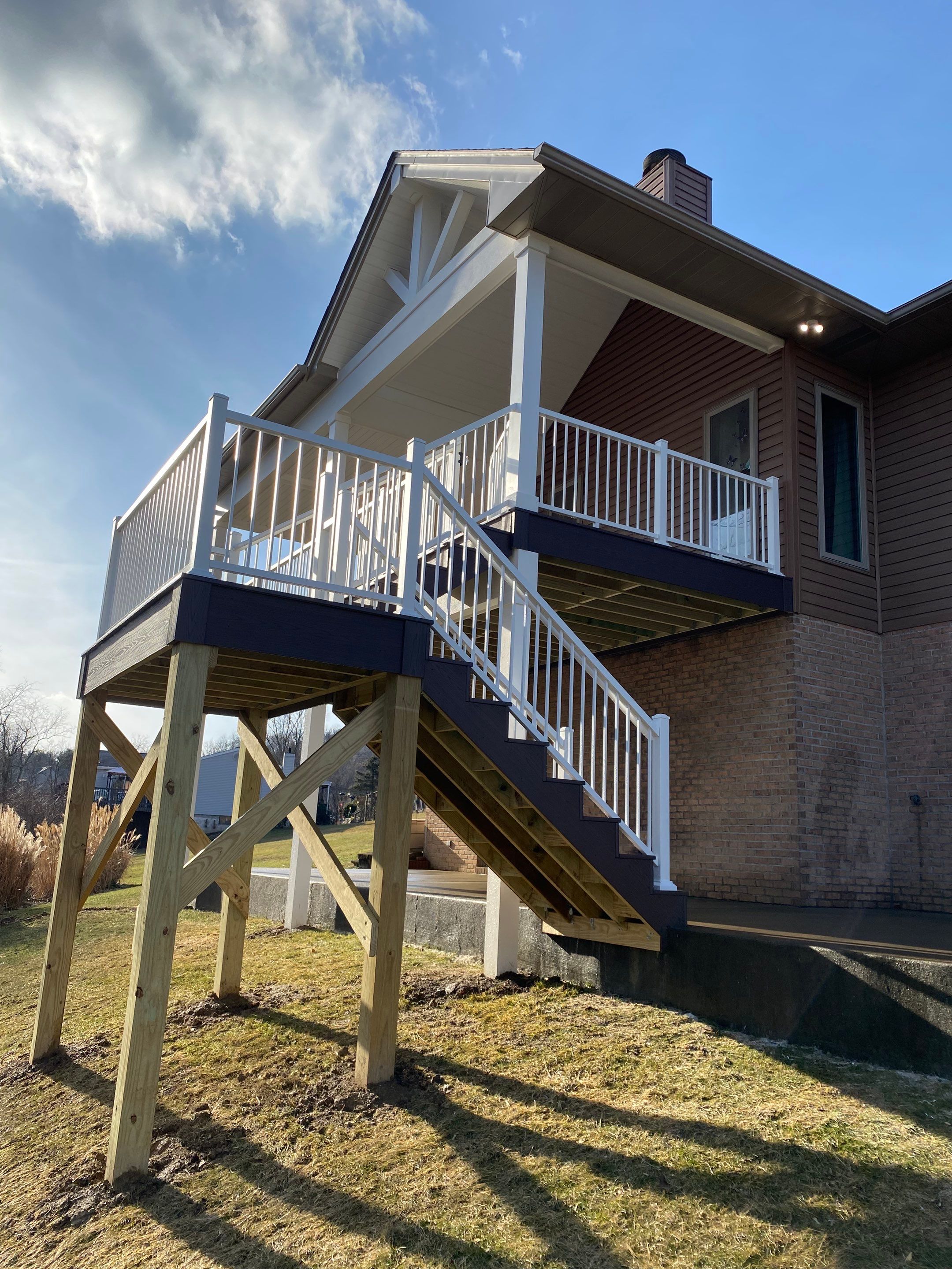 Deck and Roof Build by Cousins Roofing Siding & Decks