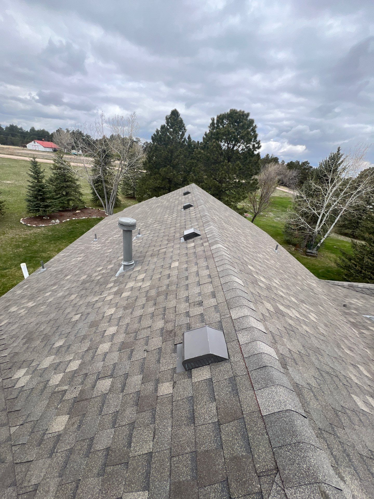 Residential Roofing Installation using Atlas Pinnacle Impact Weathered Wood by Blue Peaks Roofing LLC 