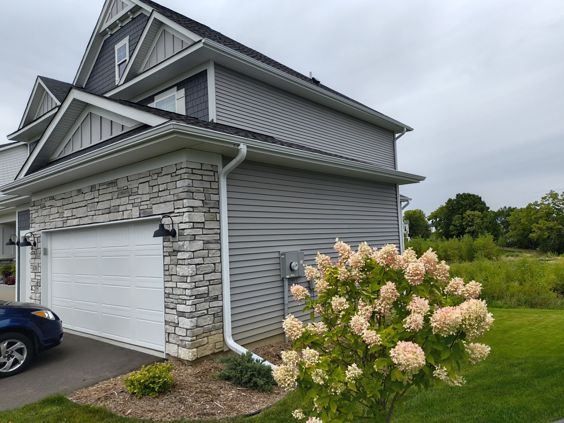 5-Inch Seamless Gutter Installation – 3-Story Home in Dayton, MN by Next Level Seamless Gutters / Exteriors Inc.