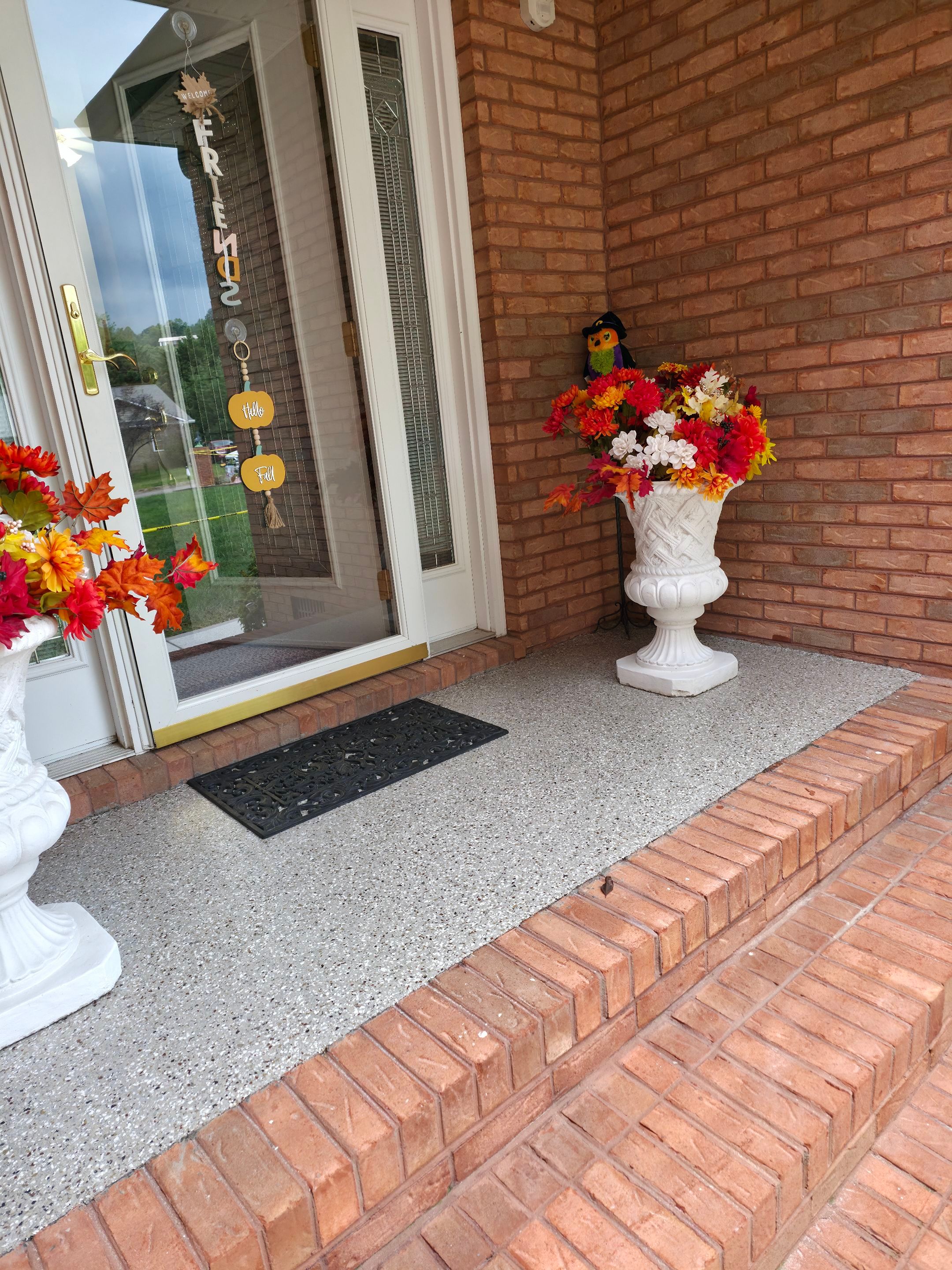 Driveway Using Creekbed and Garnet by Elite Floor Solutions
