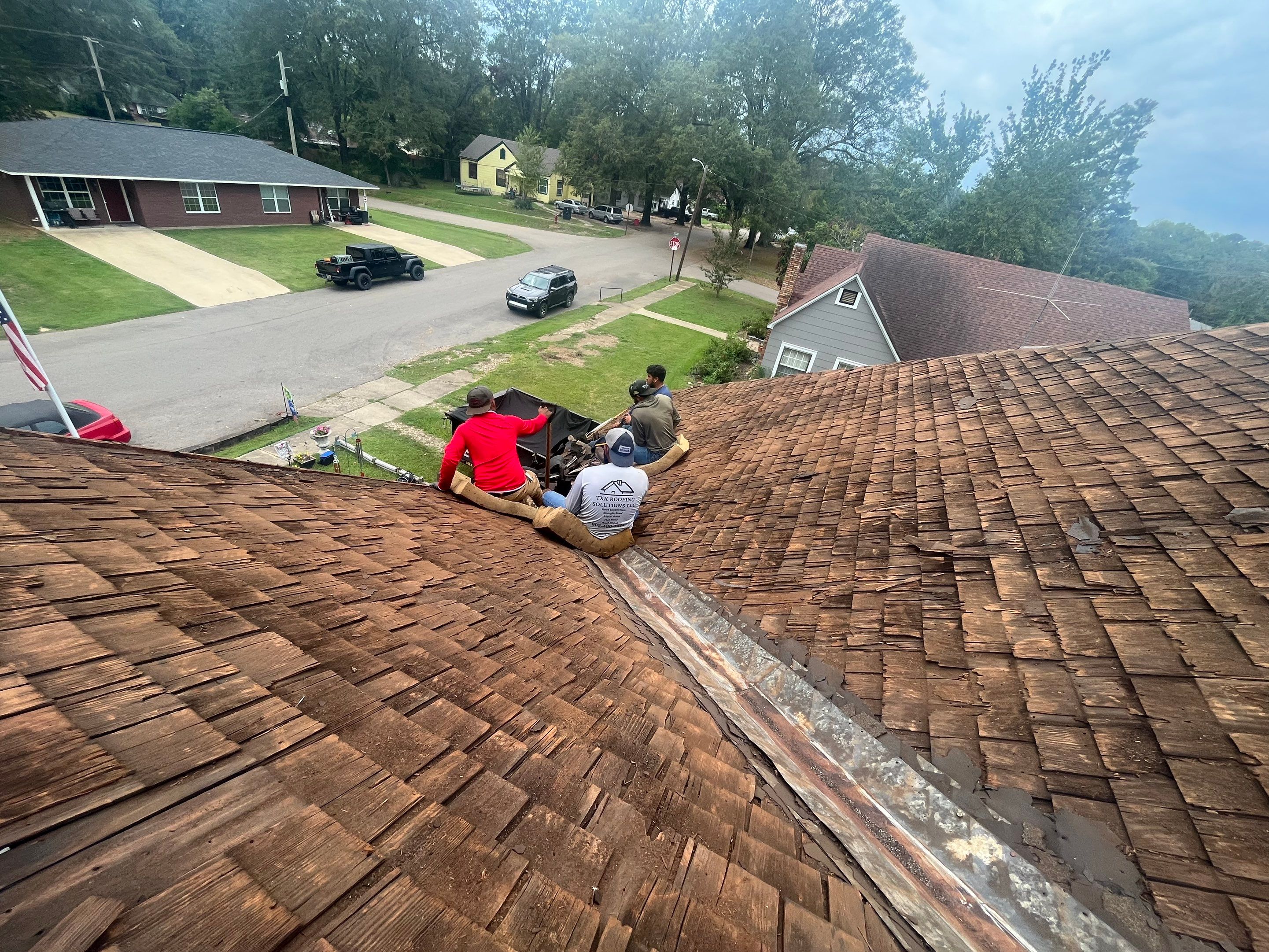 Residential Metal Roof Replacement using Reed's Metals: Colored Residental Panel (Burgundy) by Hostetler Roofing