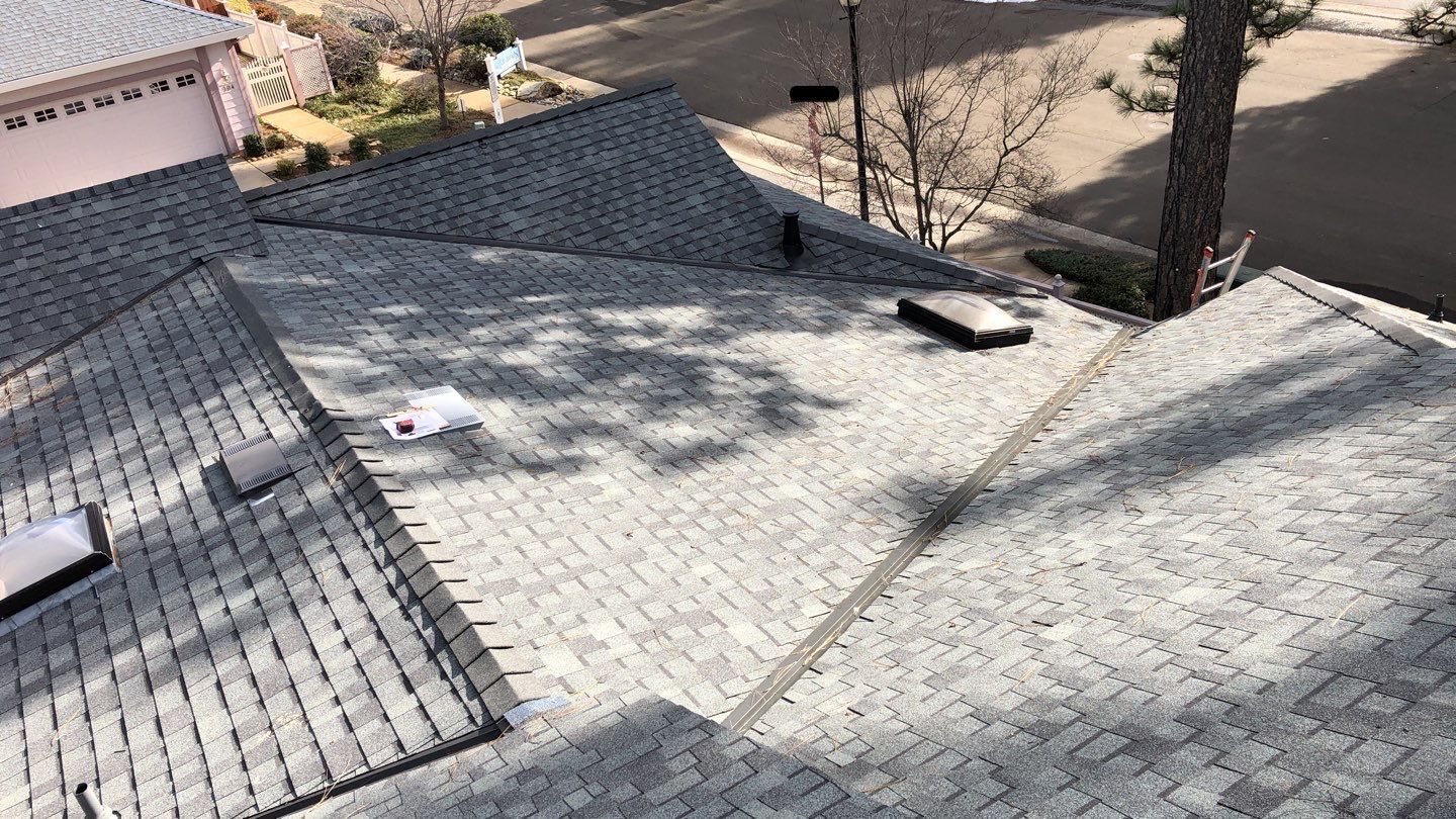 Attic Insulation, Roofing, and Solar for this in-town home by Byers Enterprises 