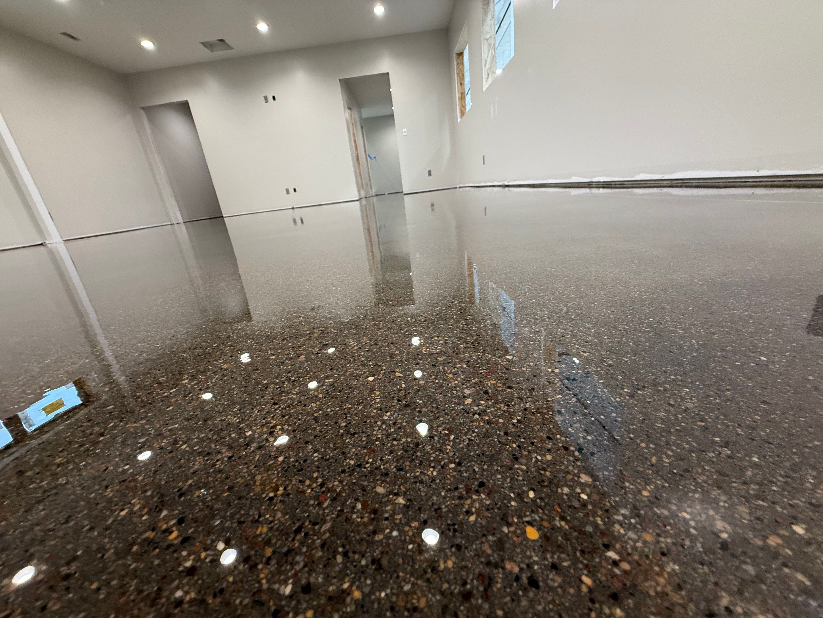 Industrial Concrete Polishing and Coating for Large Manufacturing Warehouse by Select Painting, Coatings & Garage Cabinets