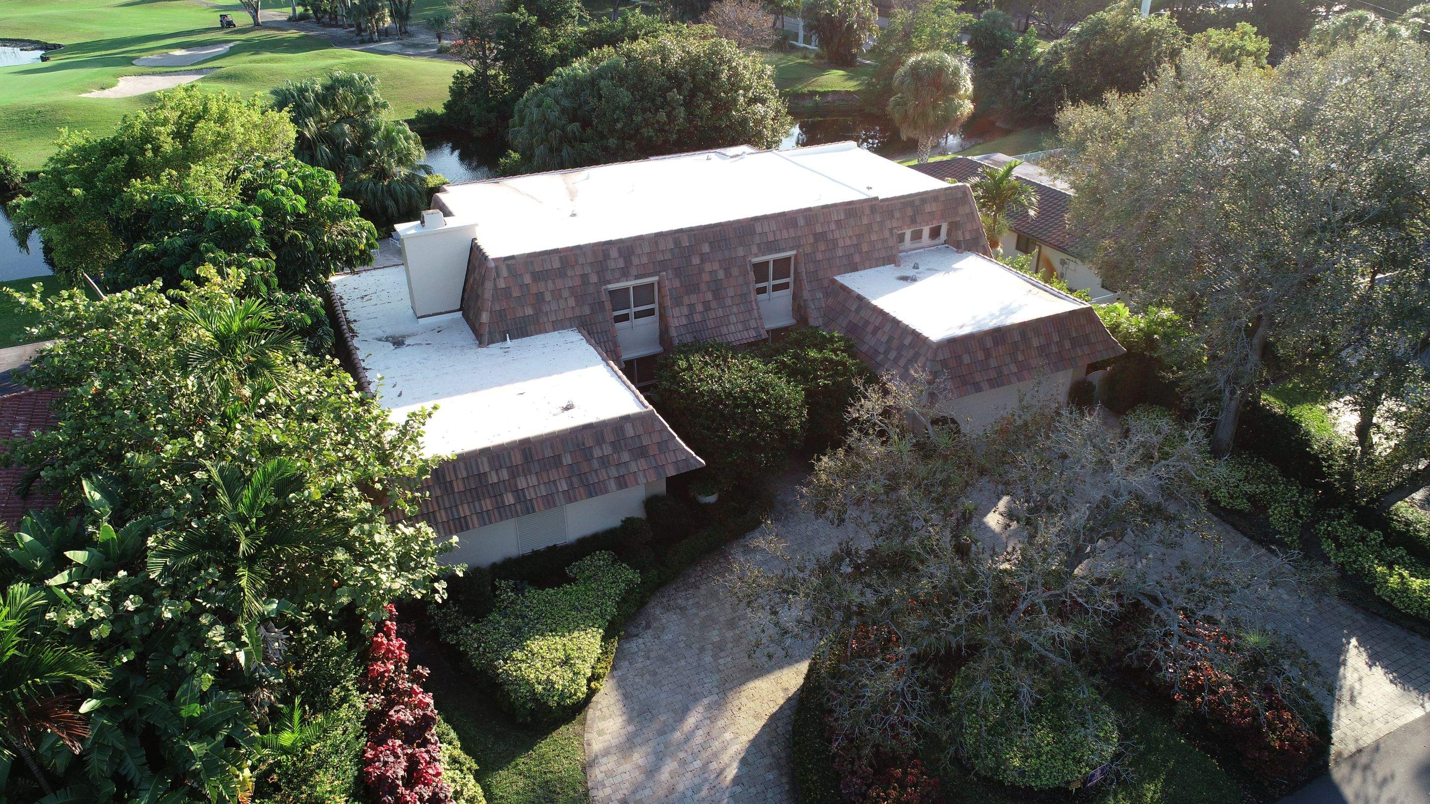 Amazing TPO flat deck re-roof with Eagle mansard in Hollywood Florida.  by First Due Roofing