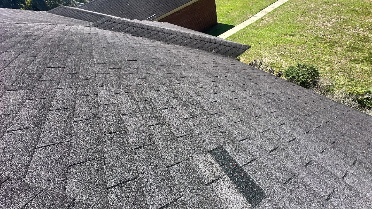 Residential Roofing Installation using Benton 26Ga 1inc Snapcock Metal Roof KYNAR Matte Black by Talya Roofing