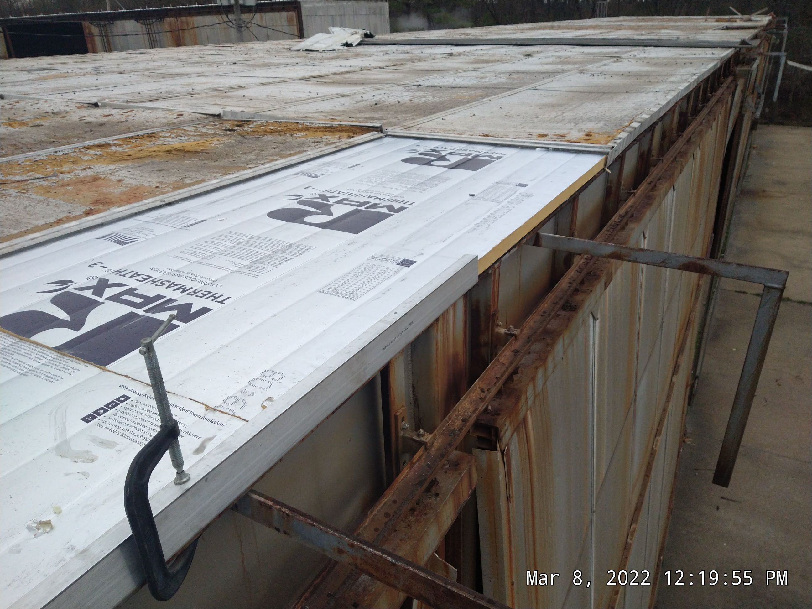Commercial Roofing Installation using Aluminum Roofing panels by Hostetler Roofing