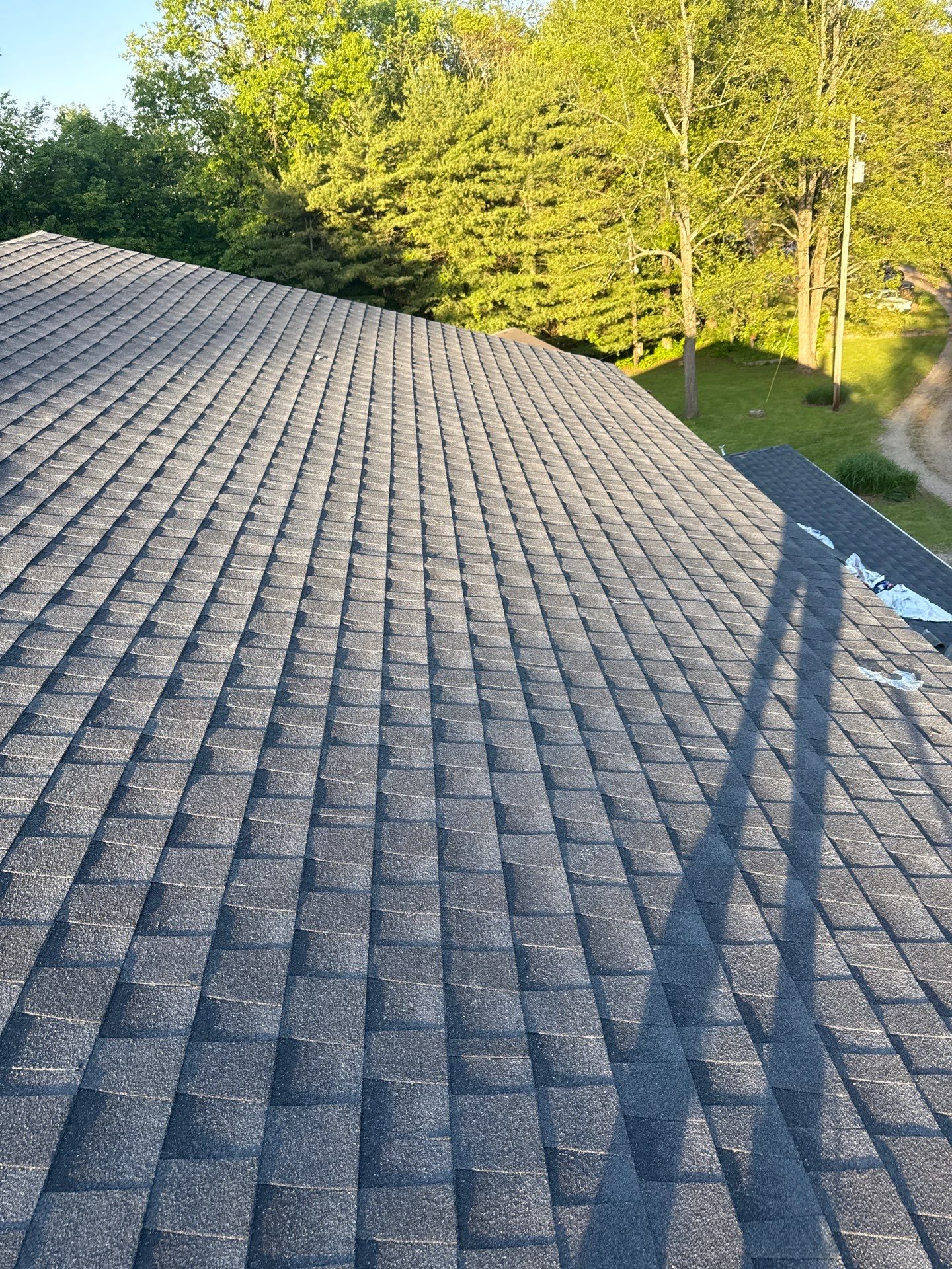 Residential Roofing Installation using GAF Timberline HDZ Charcoal by Rainstoppers Roofing