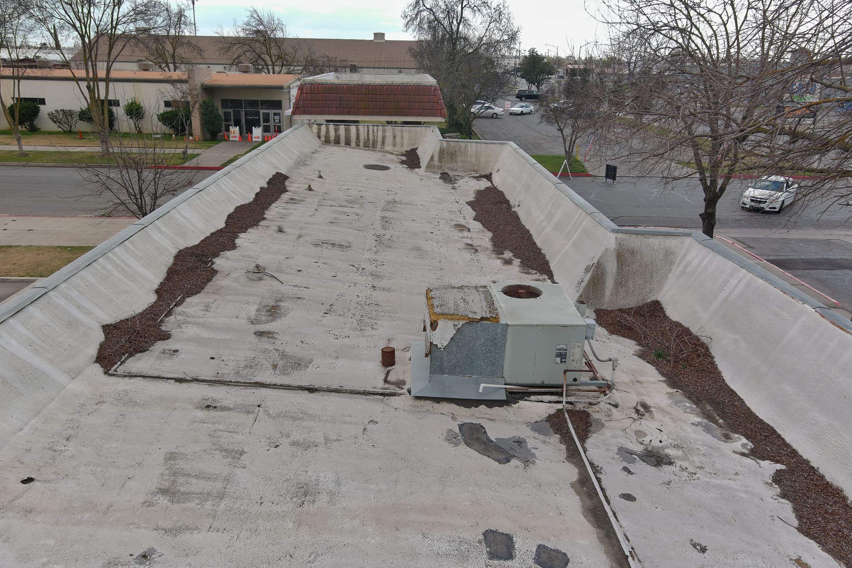 Commercial Roofing Installation using General Coatings acrylic coatings and spray foam by Straight Edge Roofing Inc