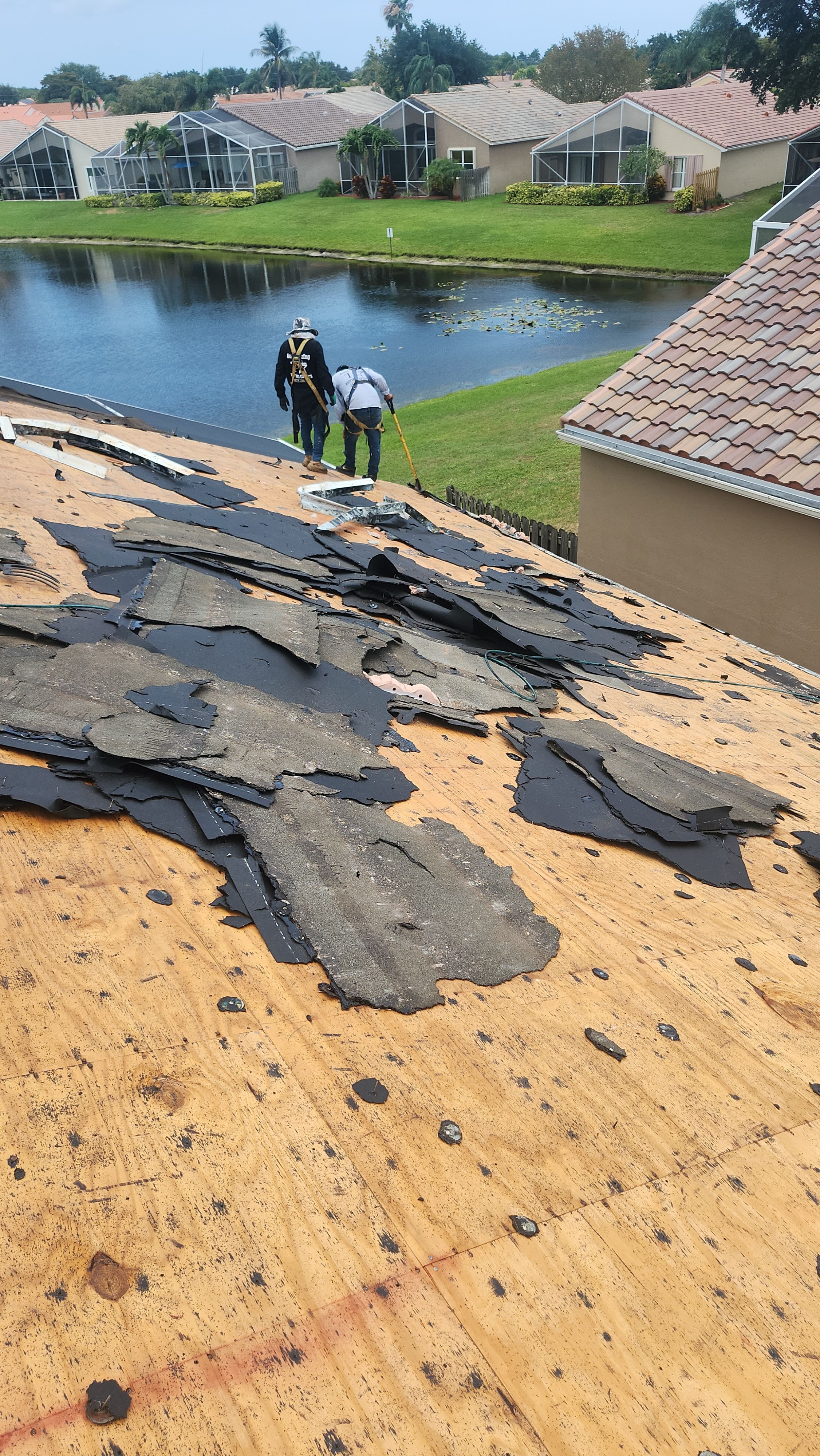 New Barrel Tile Roof Installation and Decking Repair in Boynton Beach by Aastro Roofing