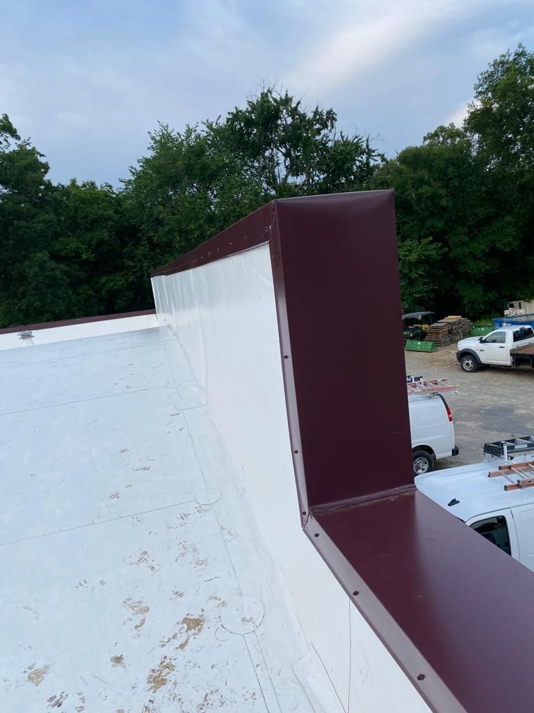 Choctaw Nation Healthcare Center - White Building by Hostetler Roofing