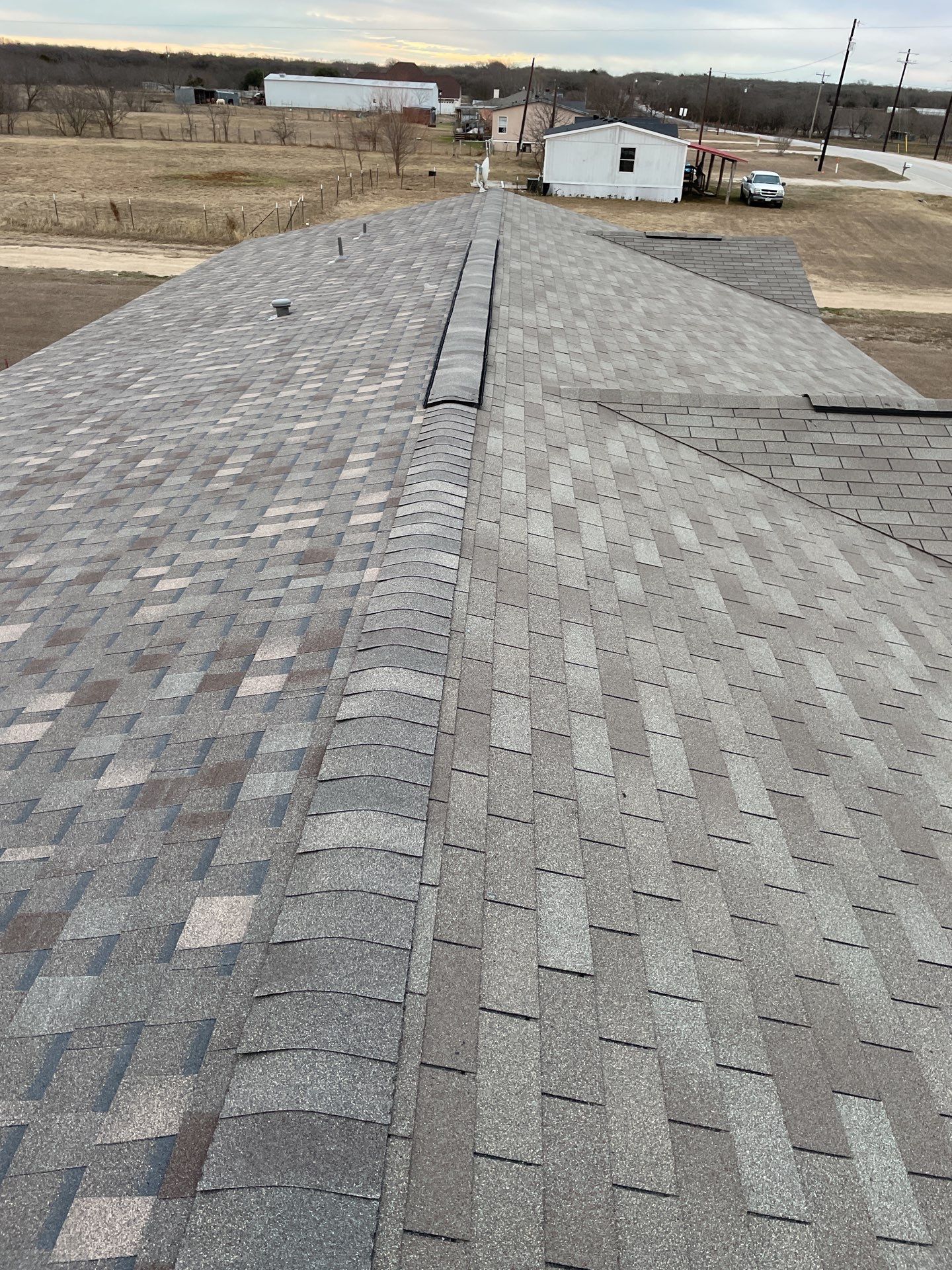 Residential Roofing Installation using ATLAS Pinnacle Pristine Shingles by Harvey Roofing & Construction