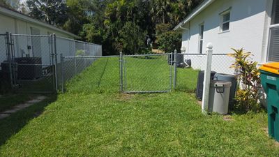 Residential Chain Link Fence and Swing Gate Installation in Naples
