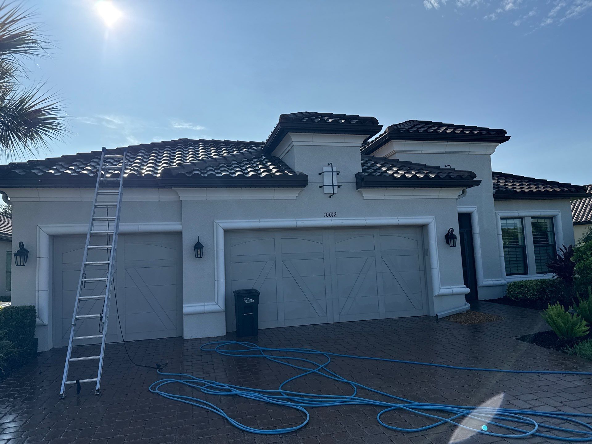 Concrete Tile Roof, Paver Driveway & Lanai Cleaning – Artisan Lakes Esplanade, Palmetto, FL by Sunshine AquaWash