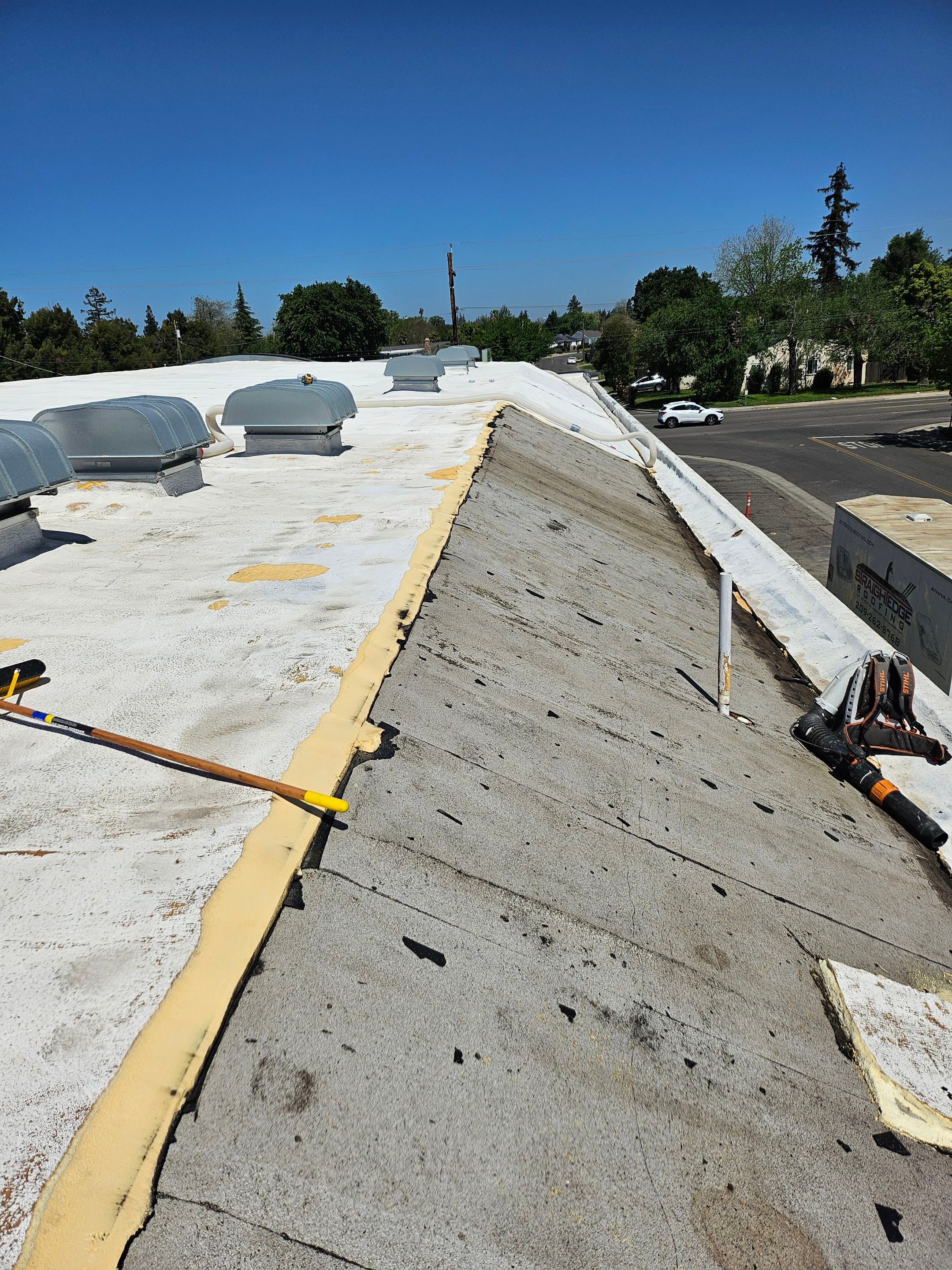 Foam Refurbish using Conklin Benchmark/PUMA XL coatings and spray foam by Straight Edge Roofing Inc