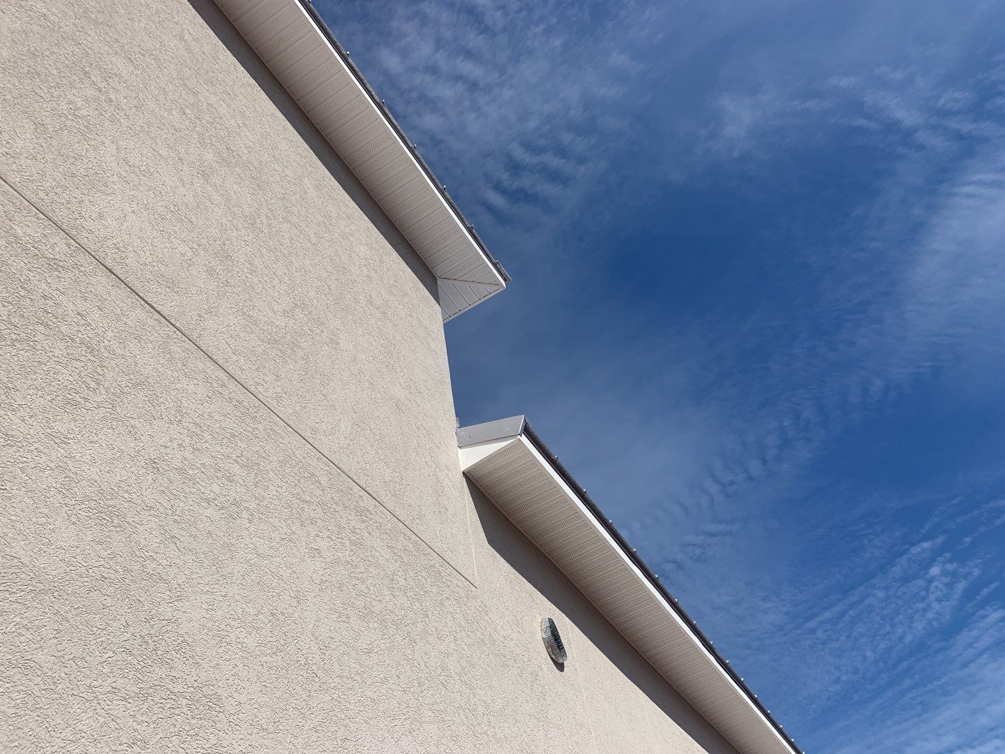 Soffit and Fascia Installation using White Vinyl Soffit in Pensacola FL by Gutter Professors