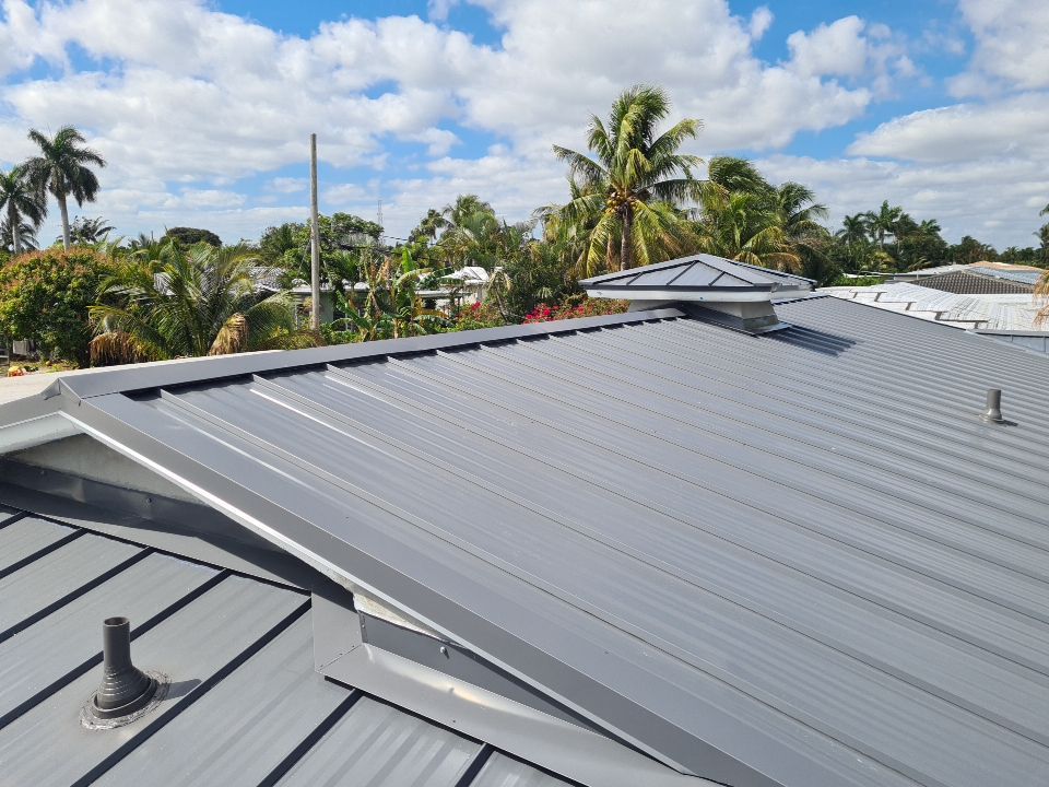 Residential Roofing Installation using 1" Nail strip metal roof by BLUES BROTHERS CONSTRUCTION CORP
