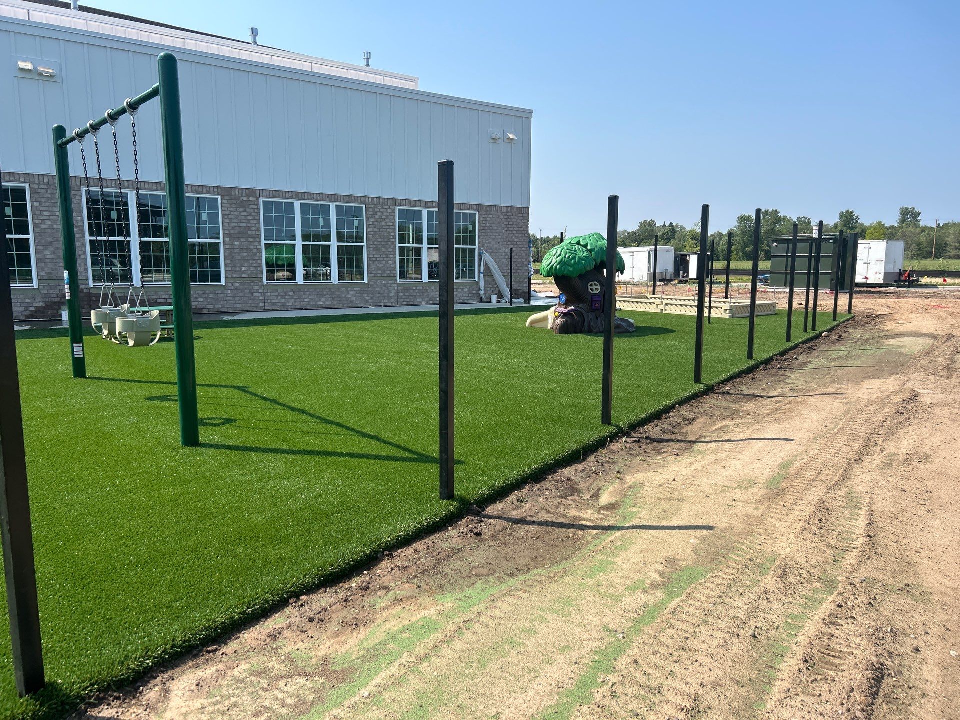 Lake Elmo Playground Artificial Turf Installation by Southwest Greens Midwest