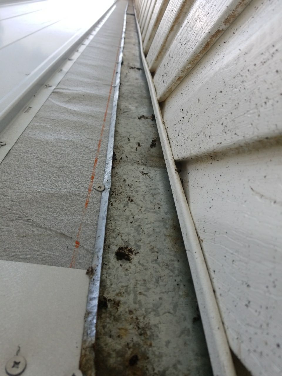 Residential Roofing Installation using Metal roofing by American Roofing & Construction LLC