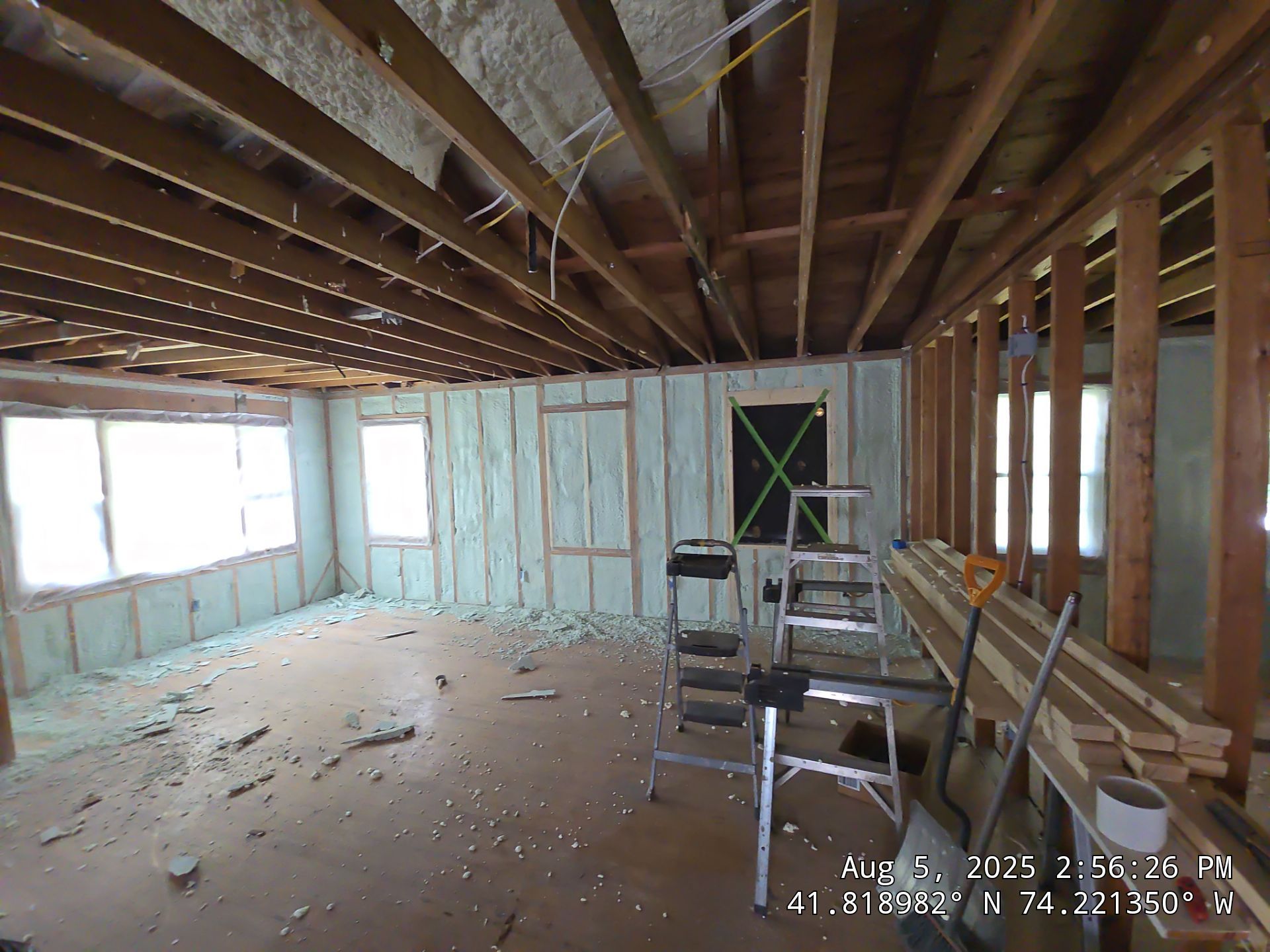 Master bedroom Exterior Walls using open cell spray foam by NYS Foam & Energy