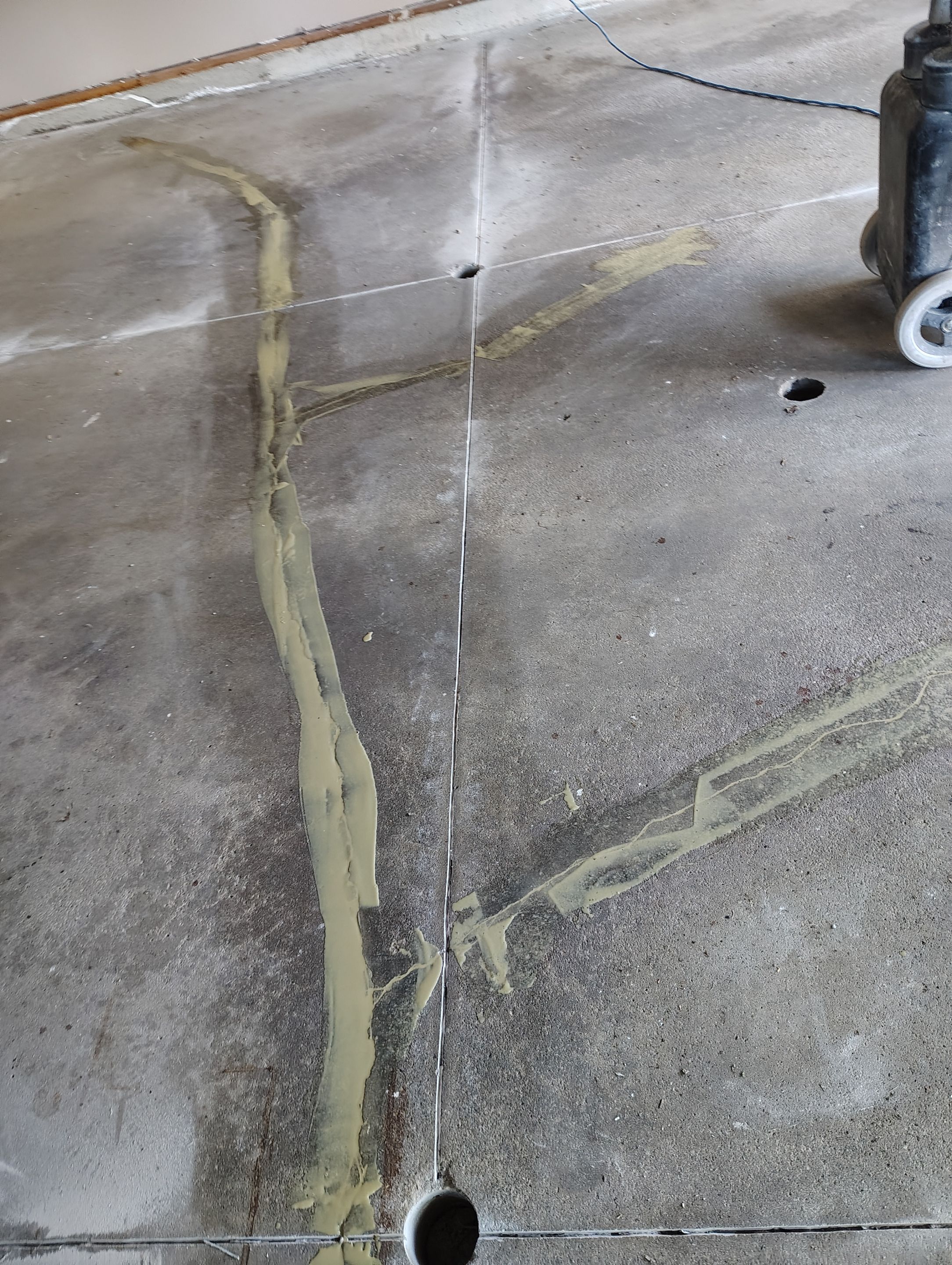 Sioux Falls Garage Concrete Repair and Epoxy Flake Floor Coating by Select Painting, Coatings & Garage Cabinets