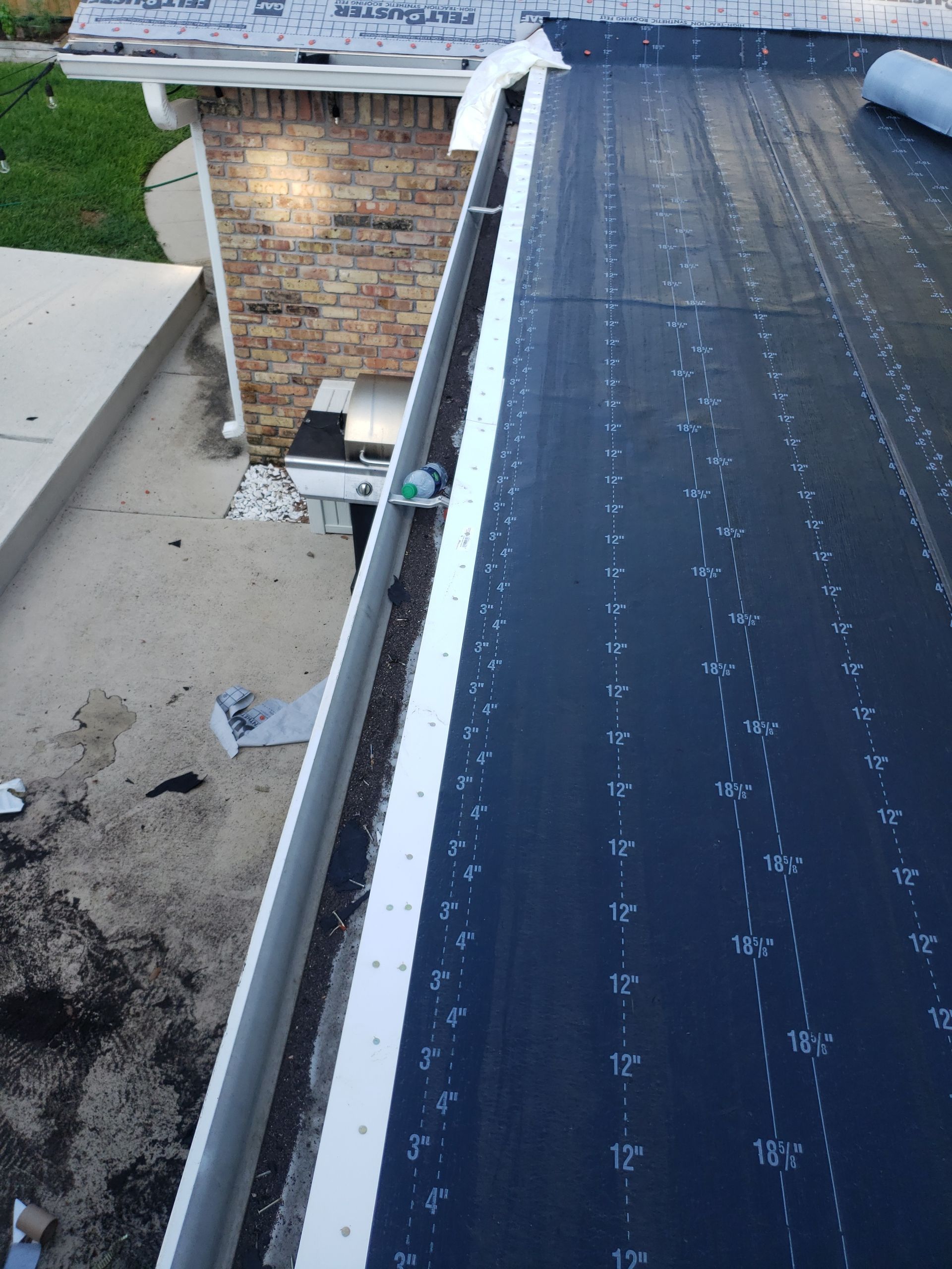 Residential Roofing Installation using Roof Replacement by American Roofing & Construction LLC