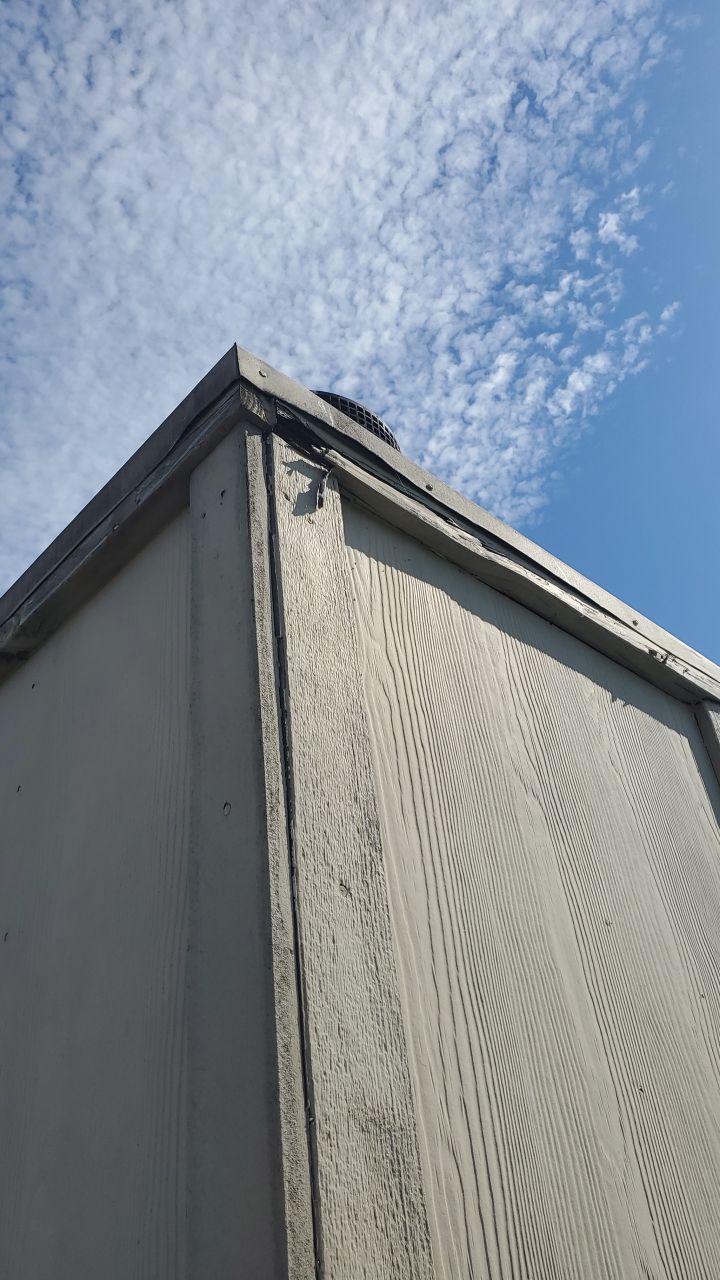 Residential Roofing Repair Replacing Chimney Cap by Lighthouse Roofing