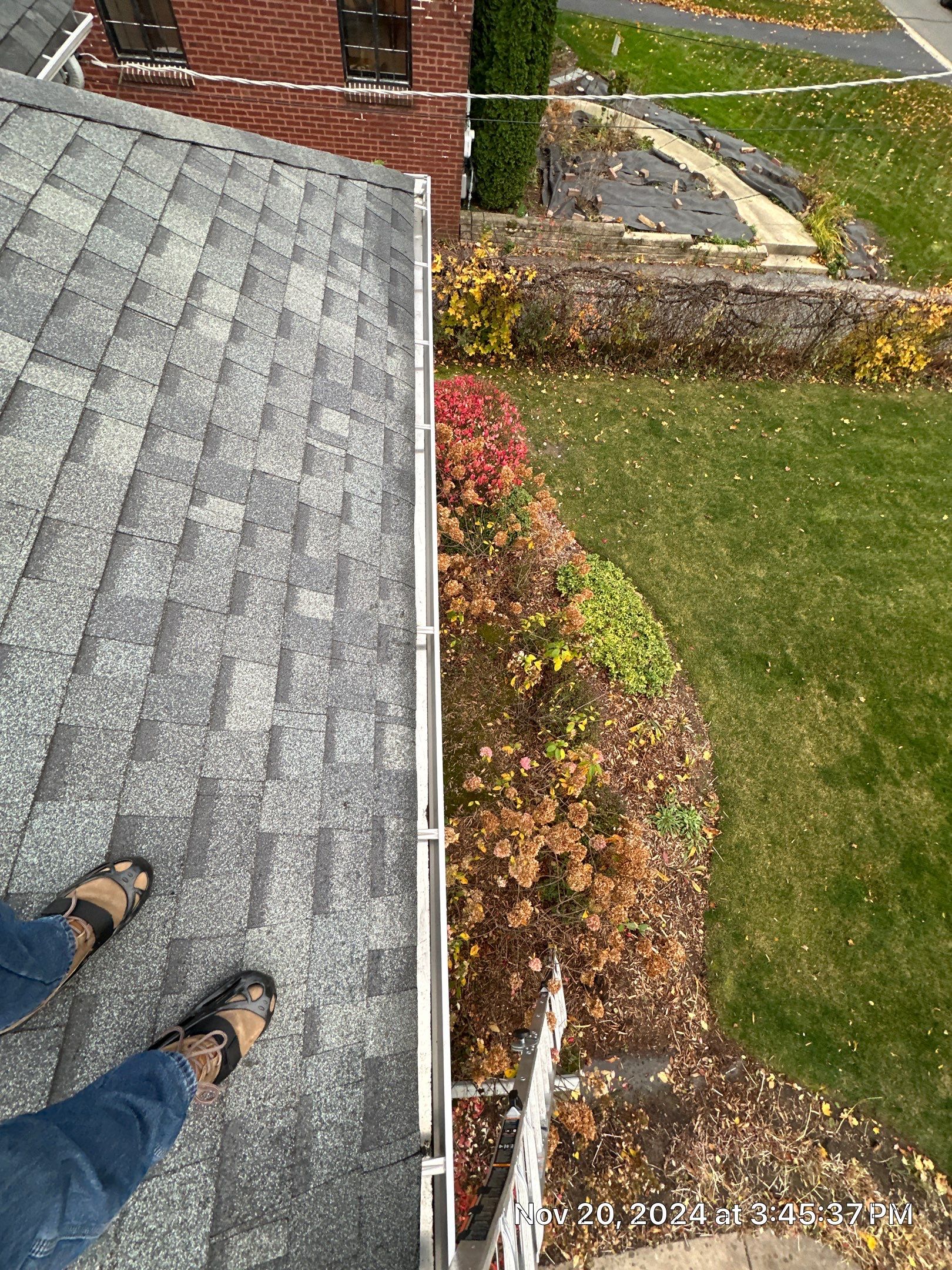 Gutter Cleaning  by Hanging Light Club LLC