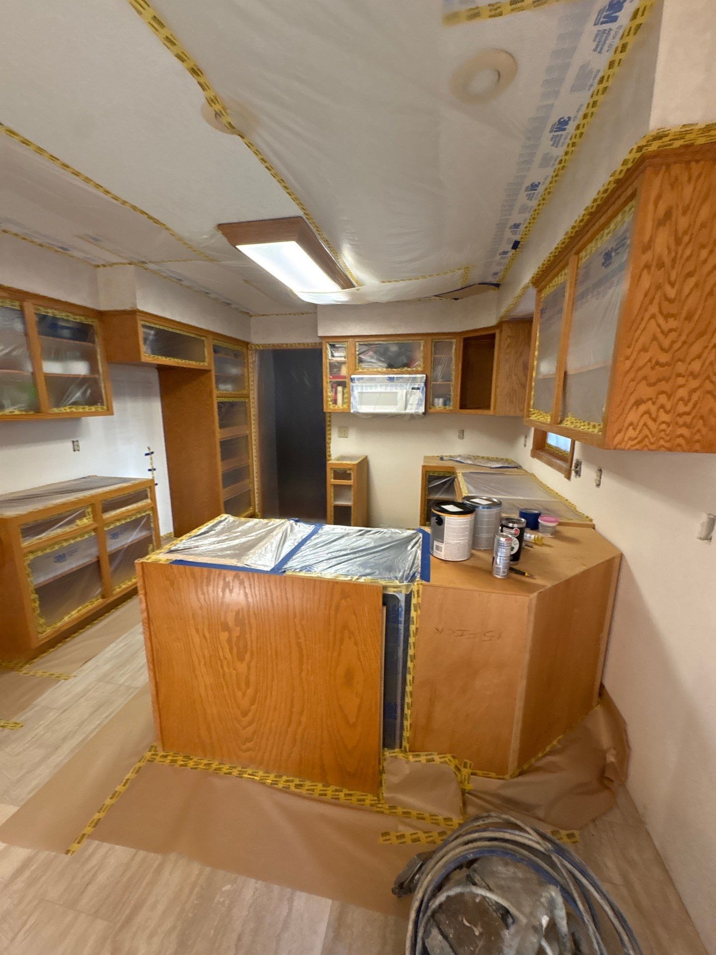 Kitchen Cabinet Painting and Hardware Update in Sioux Falls by Select Painting, Coatings & Garage Cabinets
