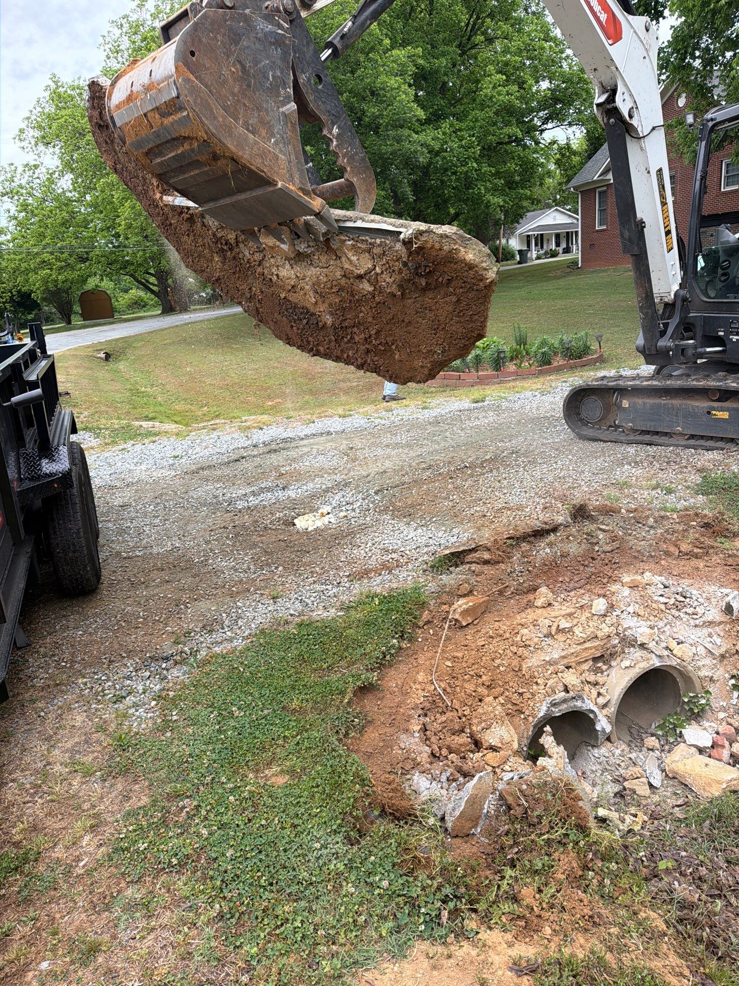 Drainage and Culvert Headwall Installation in Thomasville by Four Oaks Grading and Septic, LLC