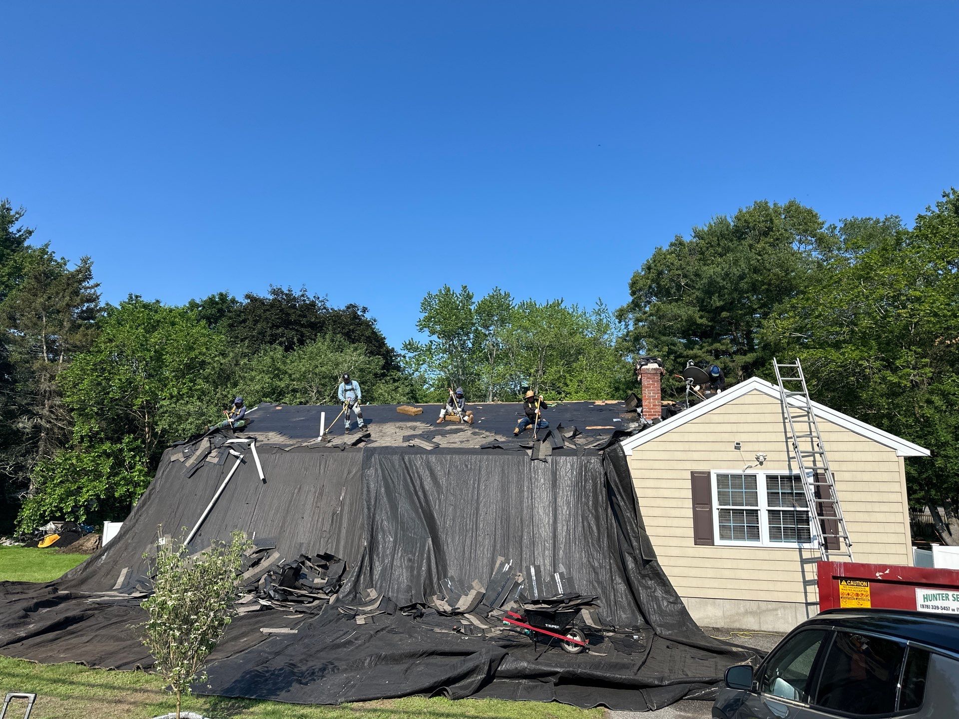 Full Roof Replacement & Chimney Repair – Onyx Black, MA by Mighty Dog Roofing of Greater Middlesex County