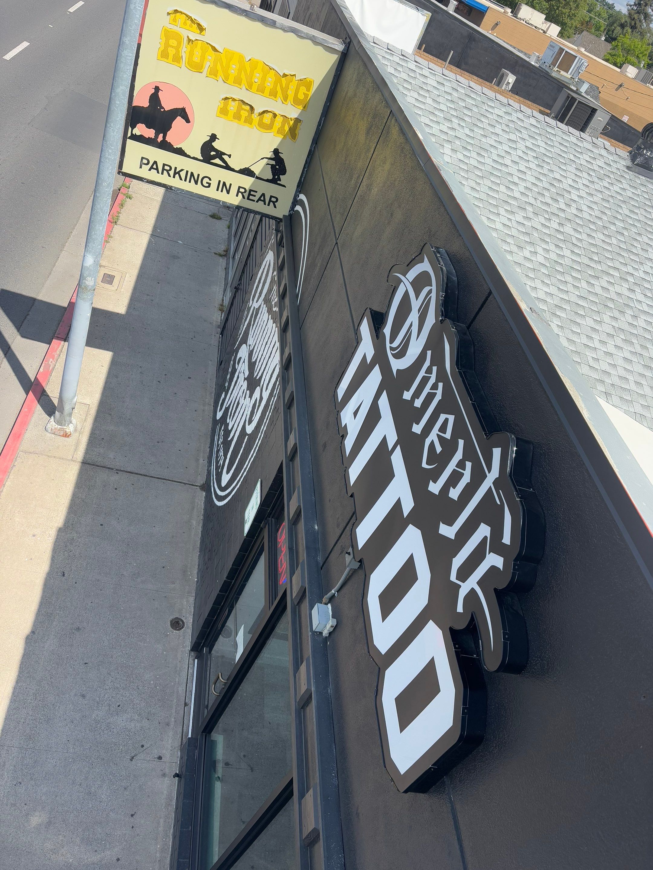 Custom Channel Letter Sign Installation for Omerta Tattoo in Modesto by City Signs