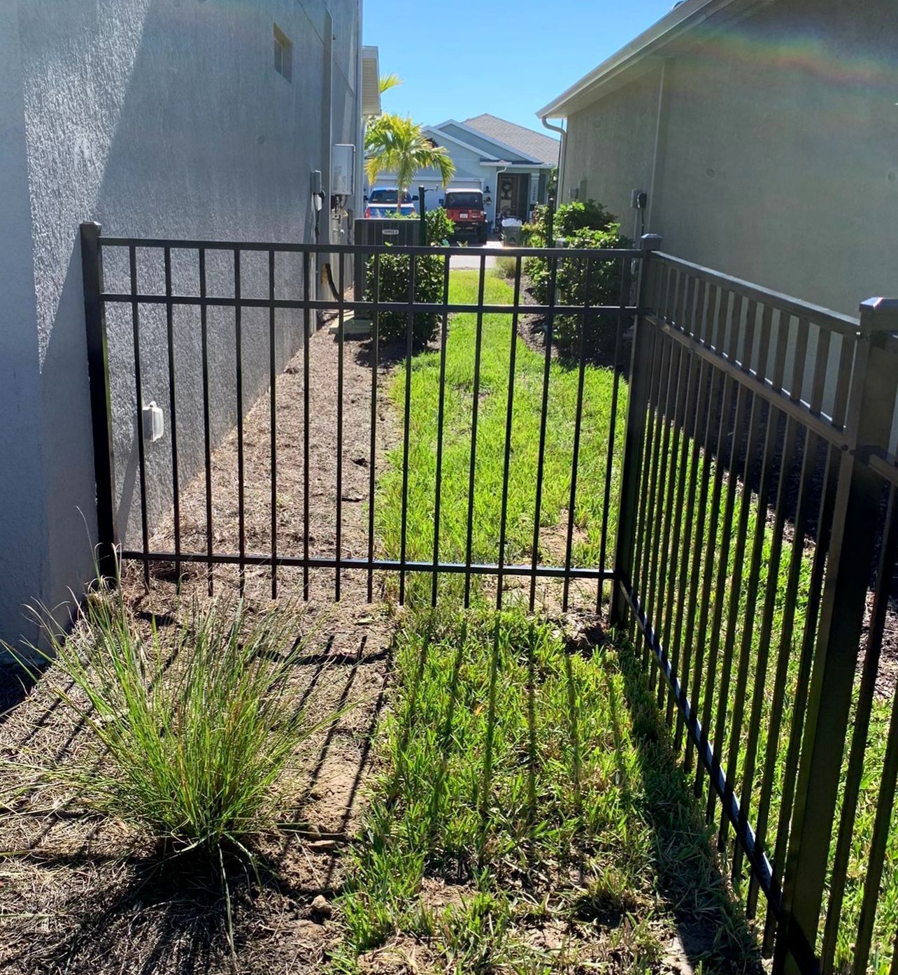 Aluminum Fence Installation using 4ft 3 Rail Black Aluminum Fence by Asap fence and gates, LLC
