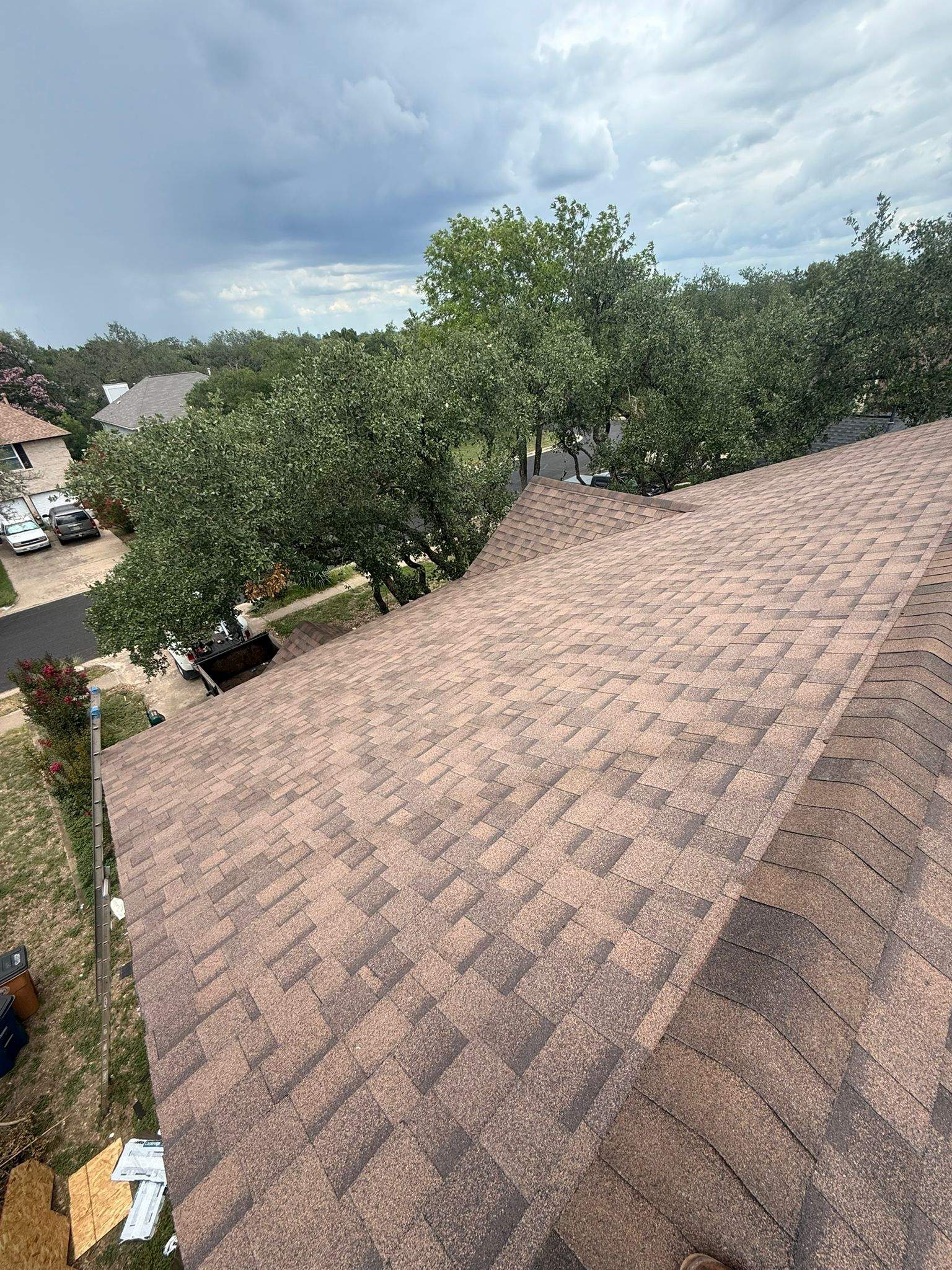 Residential Roofing Replacement and Chimney Flashing Repair in Austin by Caliber Restoration LLC