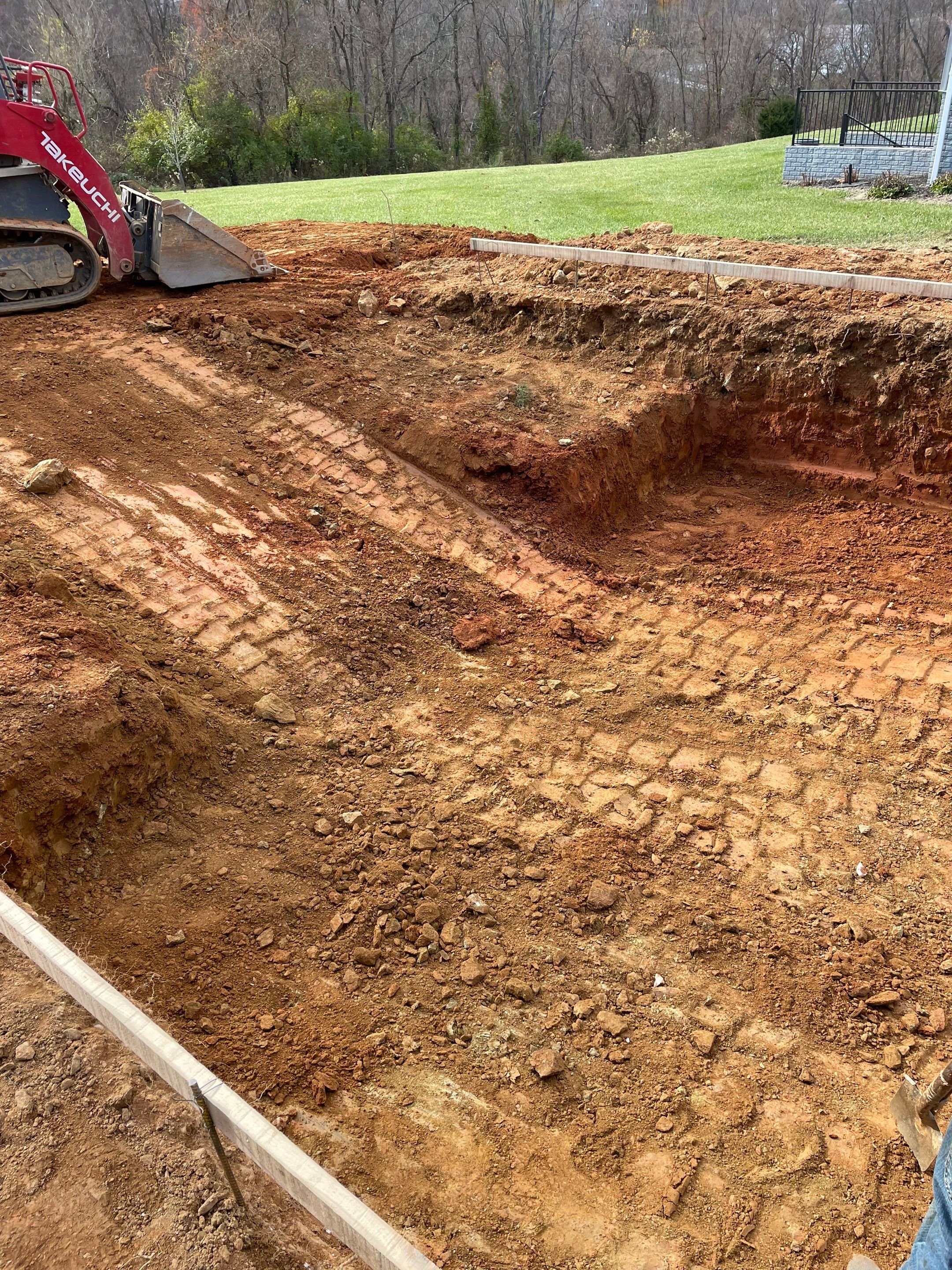 Gunite Pool w/ Raised Wall and Waterfalls by Elysium Pools