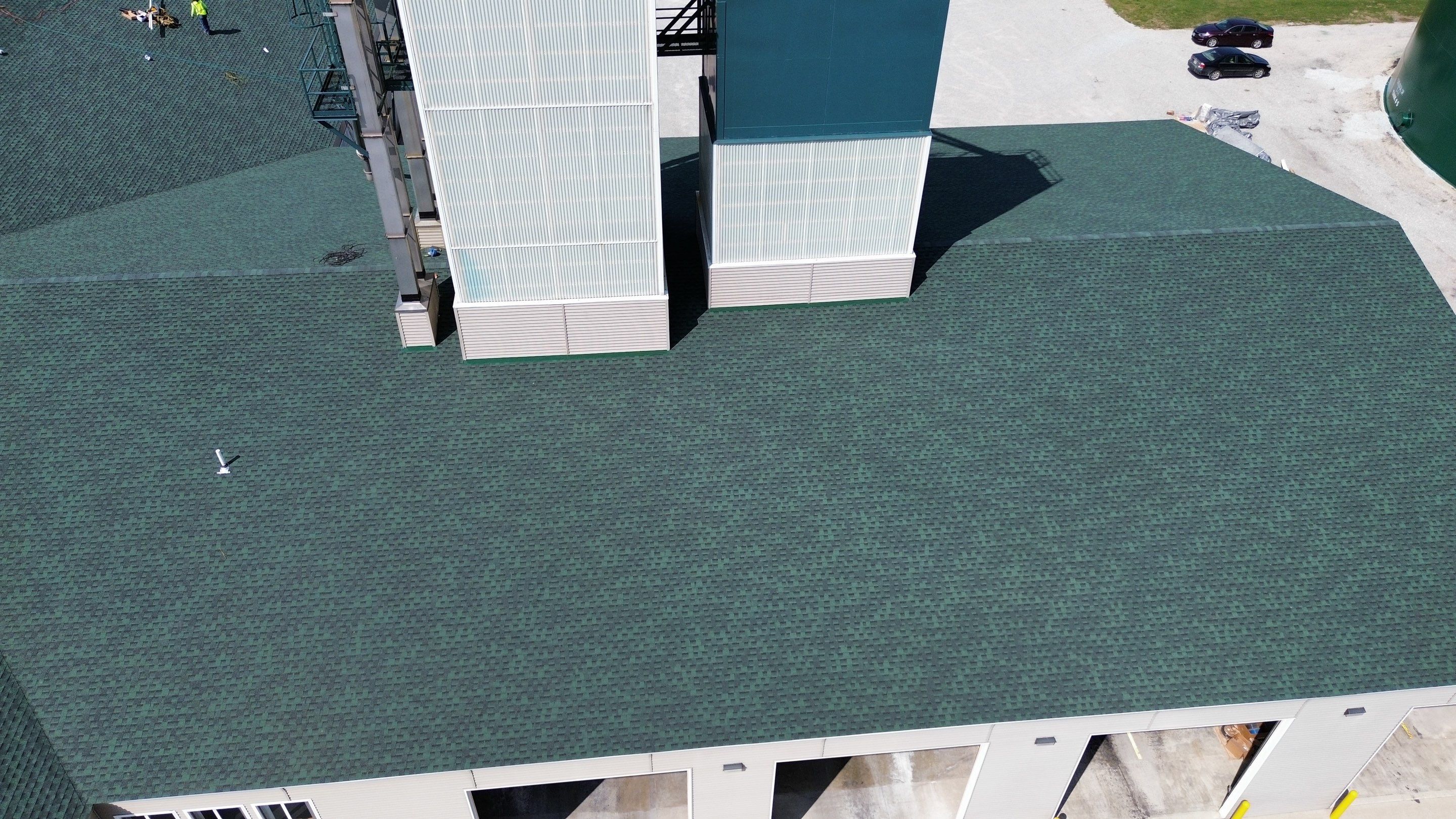 Commercial Roofing Installation using Timberline HDZ Shingles - Hunter Green by RoofX 