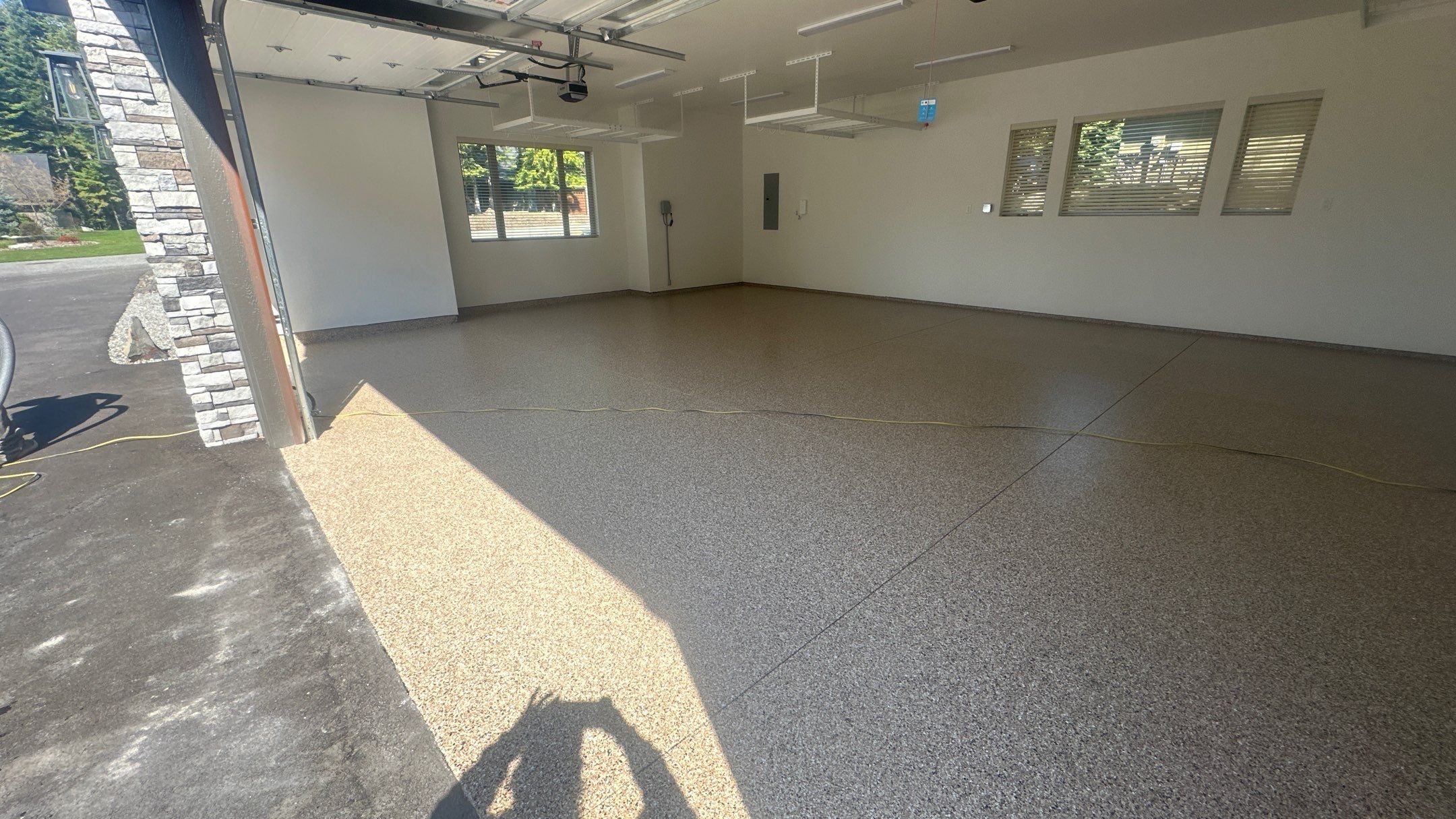Garage Transformation using Sandstone by Croc Coatings, LLC