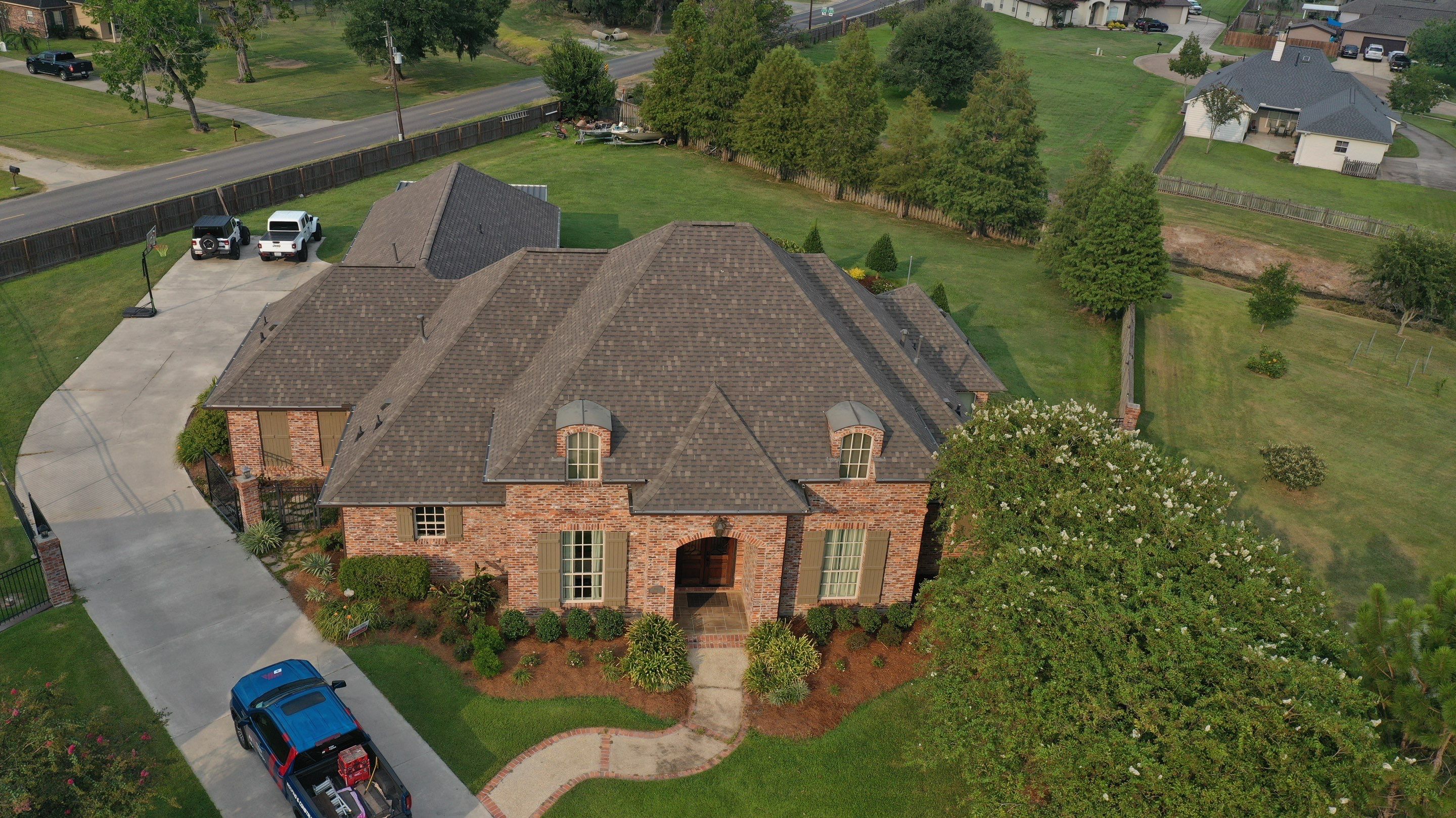 Residential Roofing Installation using Atlas Pinnacle Impact Weathered Wood; Weathered Bronze Gutters  by Top Team Construction