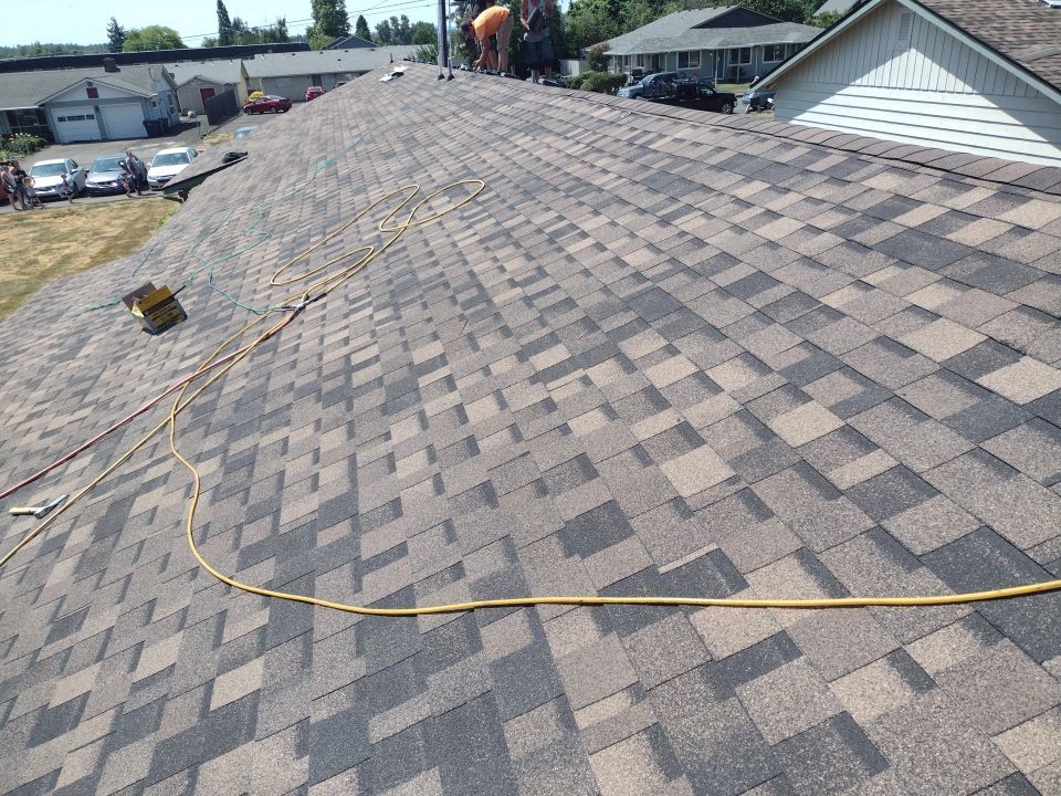 Residential Roofing Installation using IKO Dynasty (Color: Brownstone) by Orezona Building & Roofing Company, Inc.