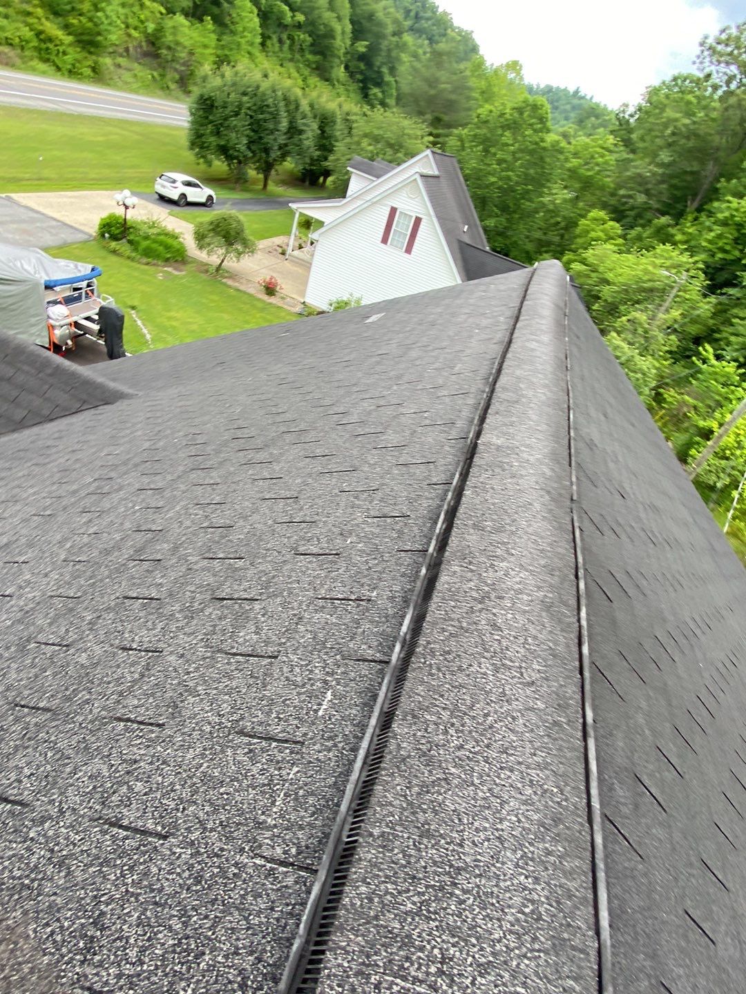 Residential Roofing Installation using Performance Shingles by Mr. Roofer
