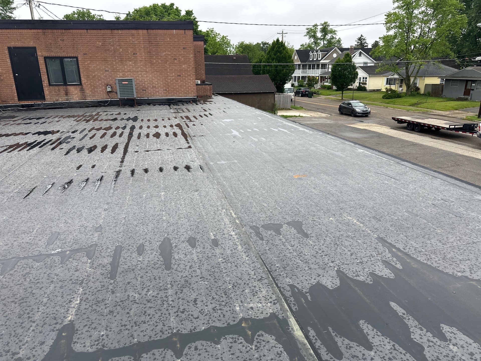 Commercial Roofing Installation using 60 mil rubber roof  by Nitro Roofing and Construction