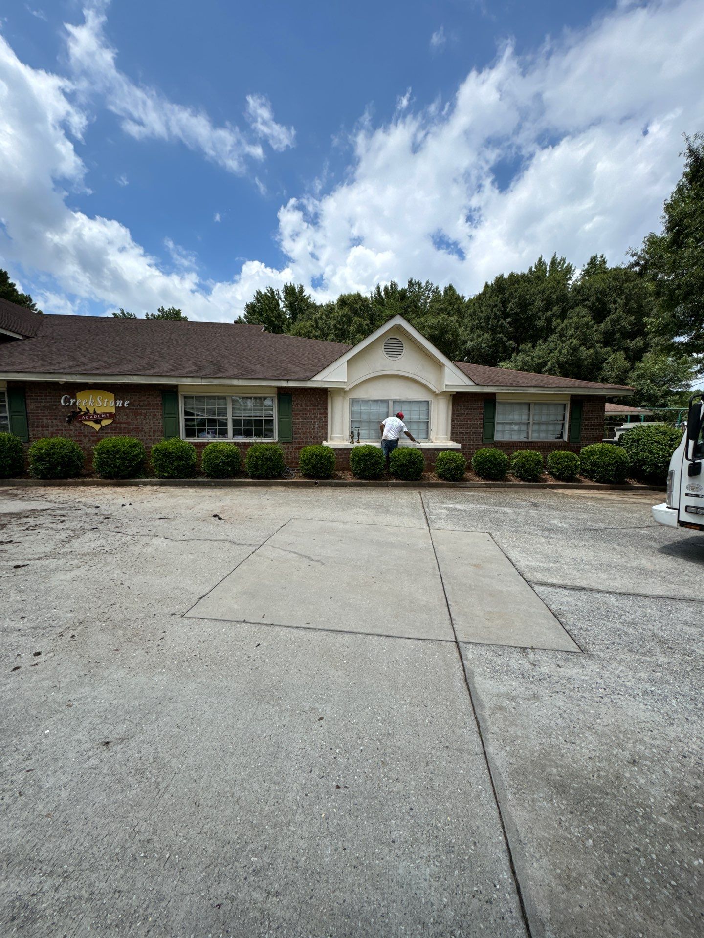 Commercial Exterior Brick and Stucco Painting in Fayetteville by Swift Home Renovations