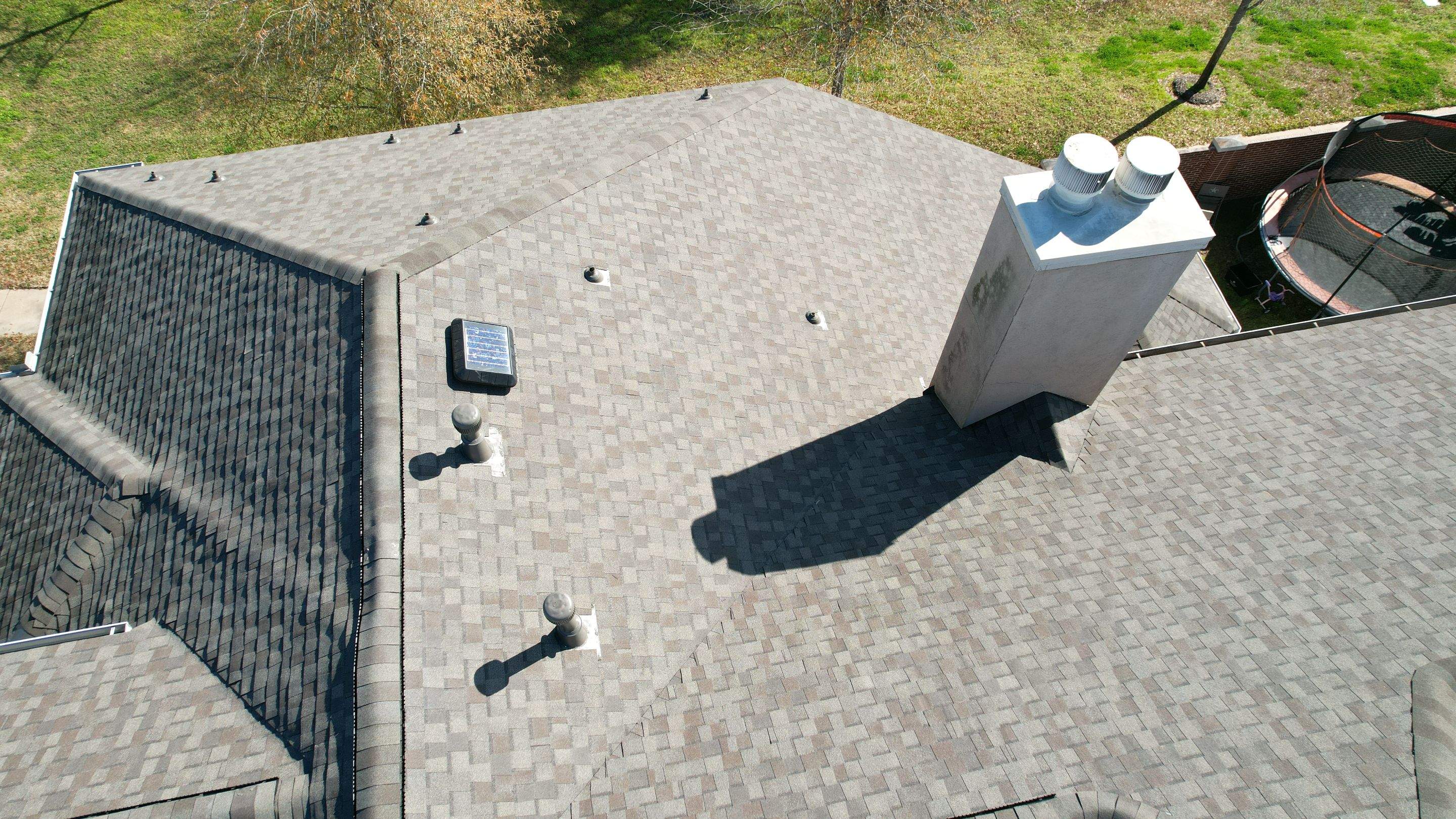 Two-Story Roof Replacement & Chimney Stucco Repair — Houston, TX by PL Roofing & SB Roofing, LLC.